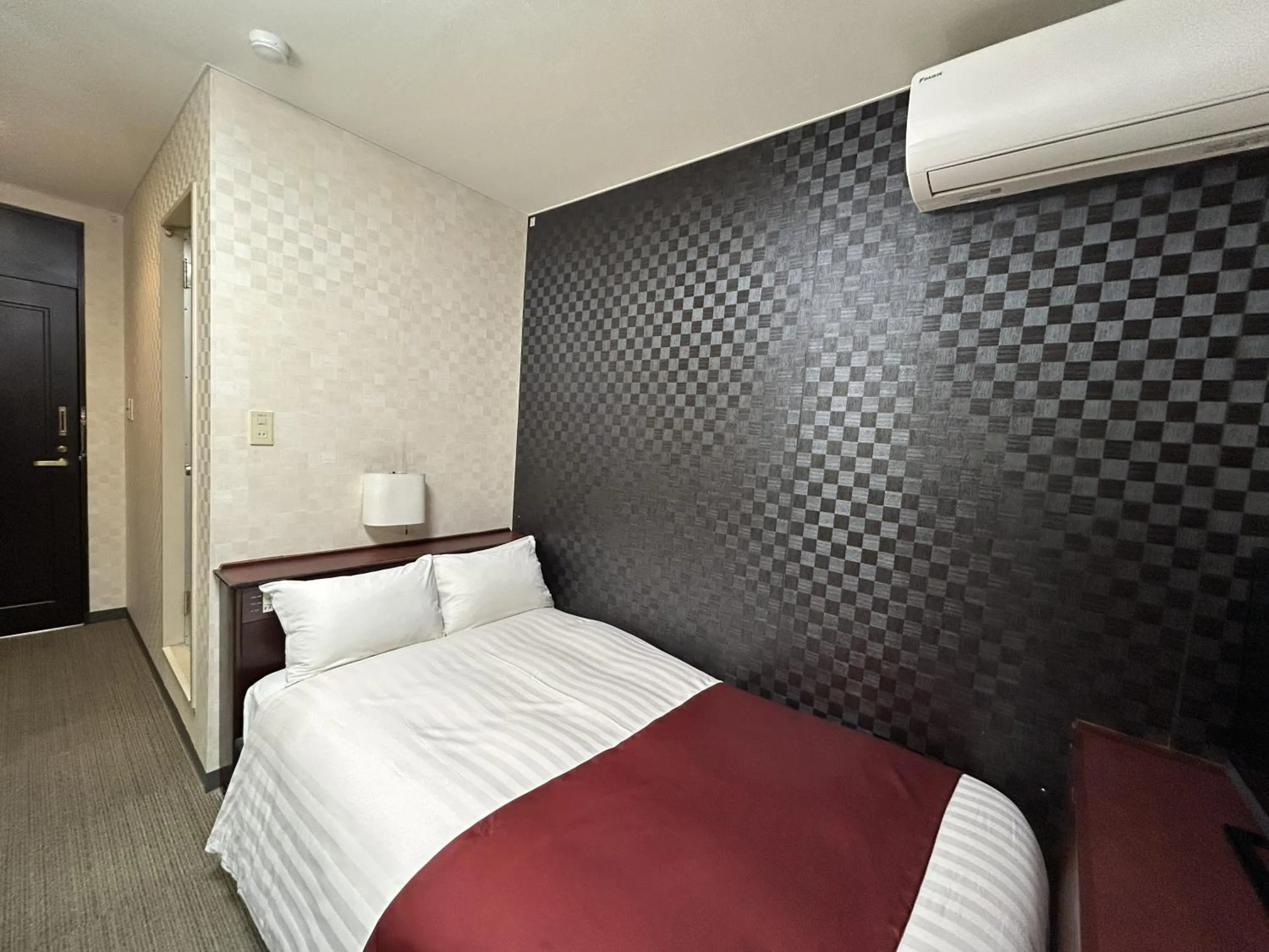 Bed in Pioland Hotel