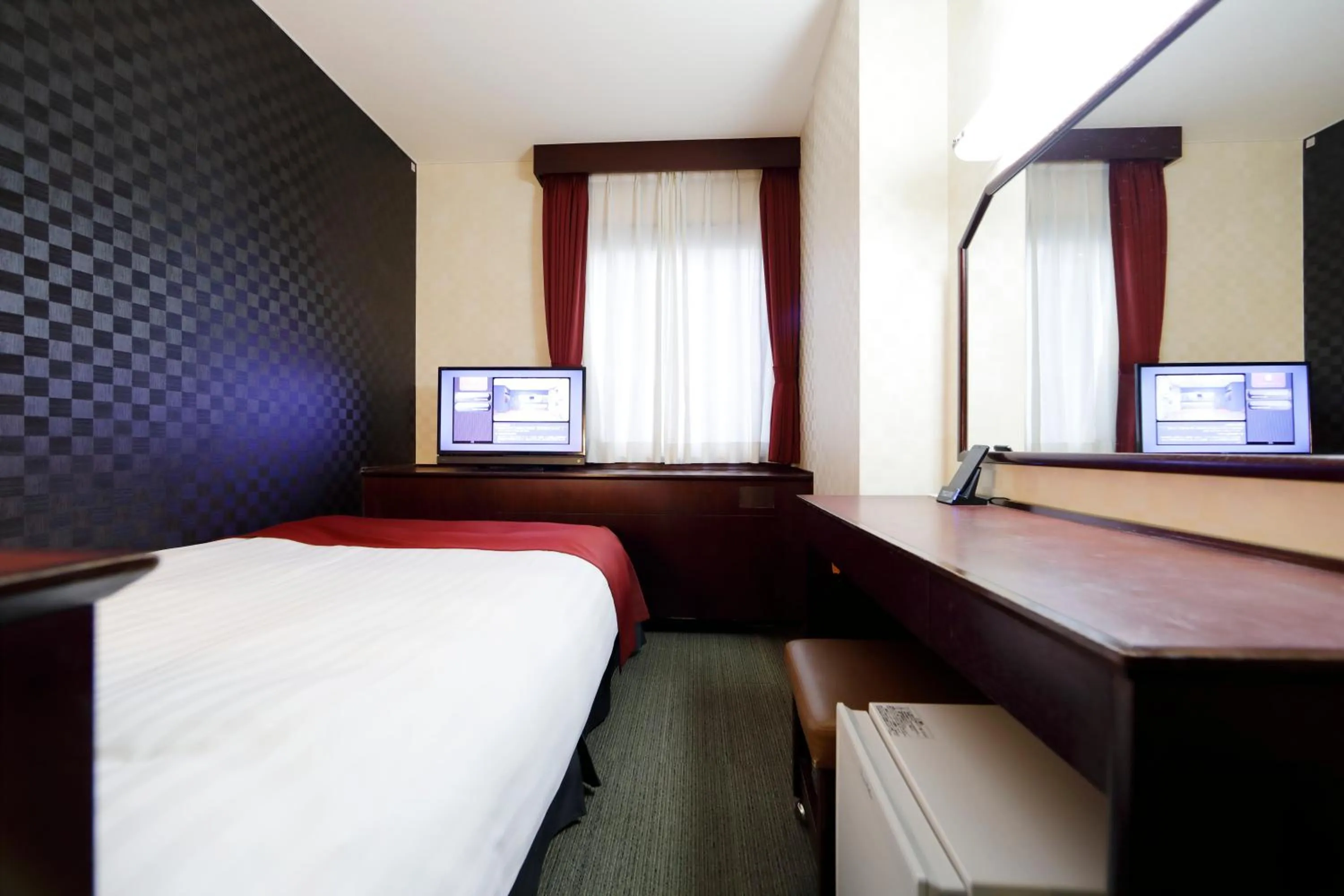 Bed in Pioland Hotel