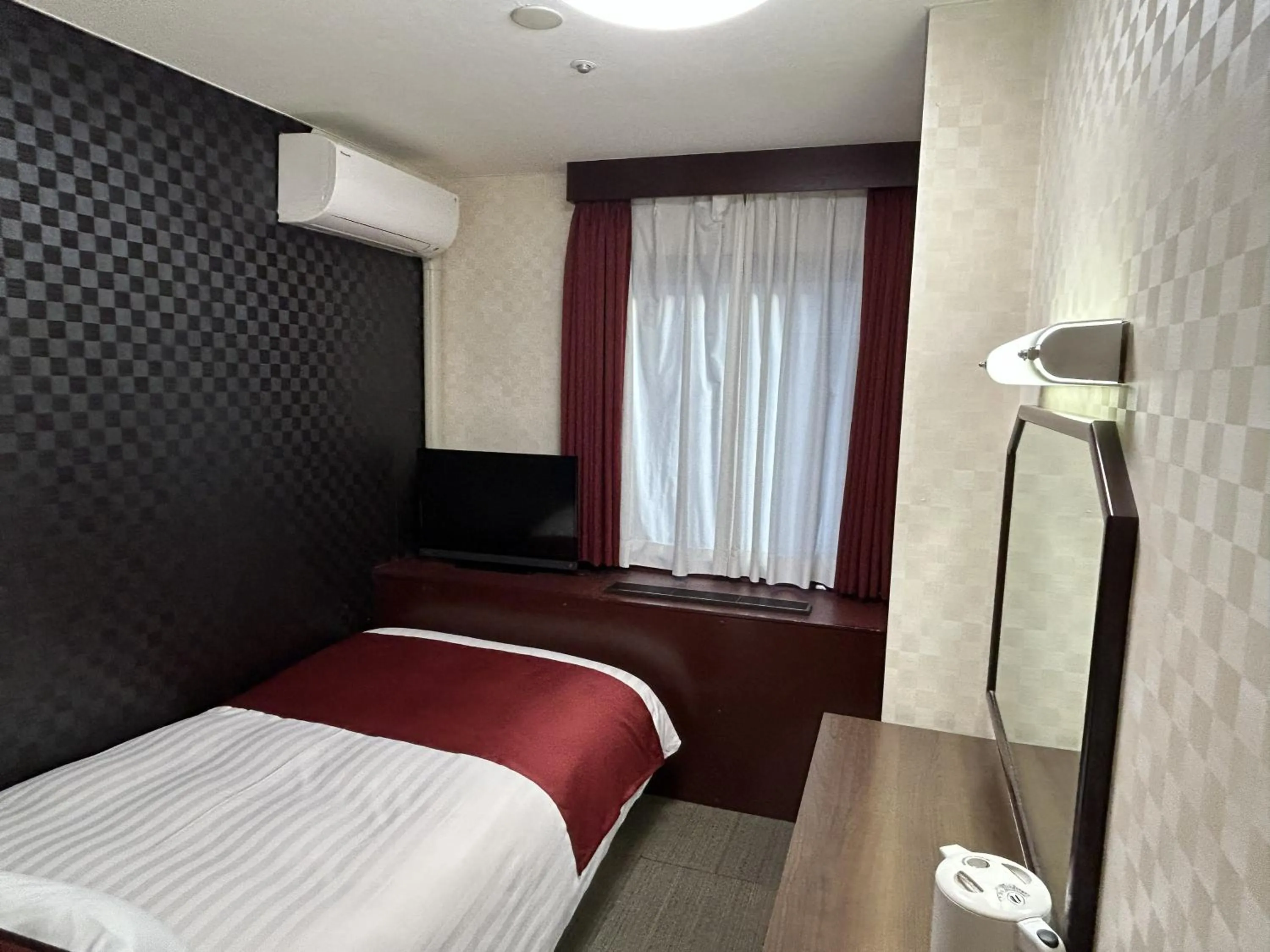 Bed in Pioland Hotel