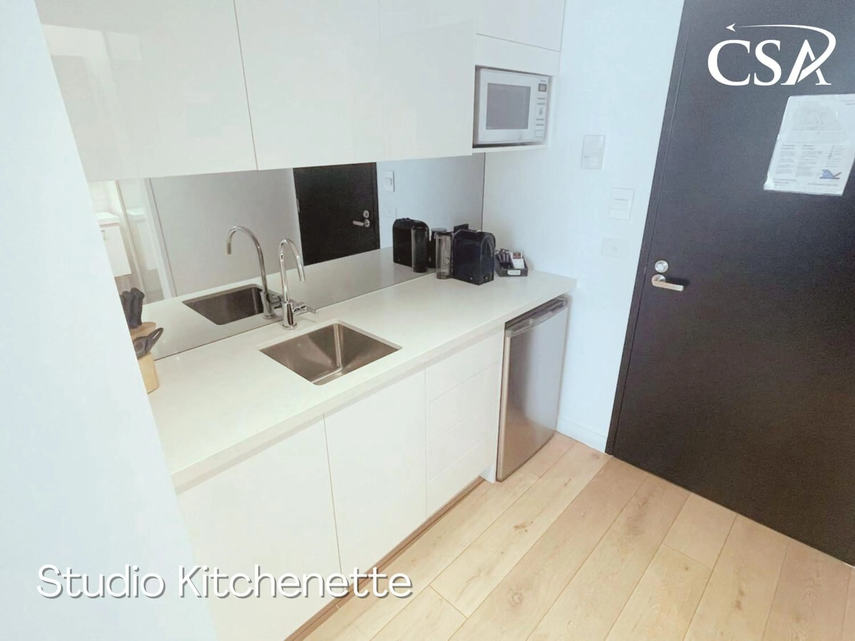 Kitchen or kitchenette in Camberwell Serviced Apartments