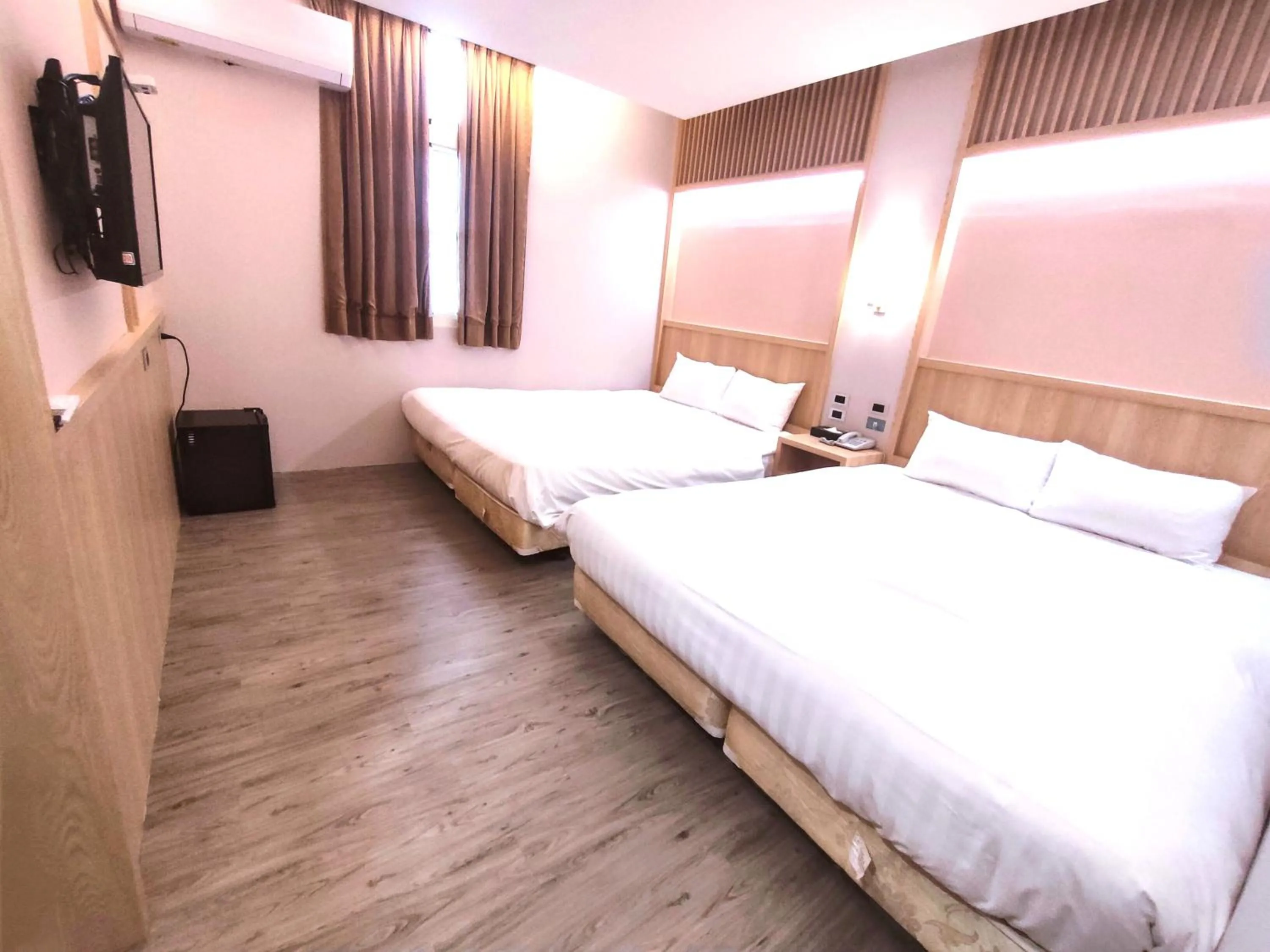 Bed in AOIKE Hot Spring Hotel