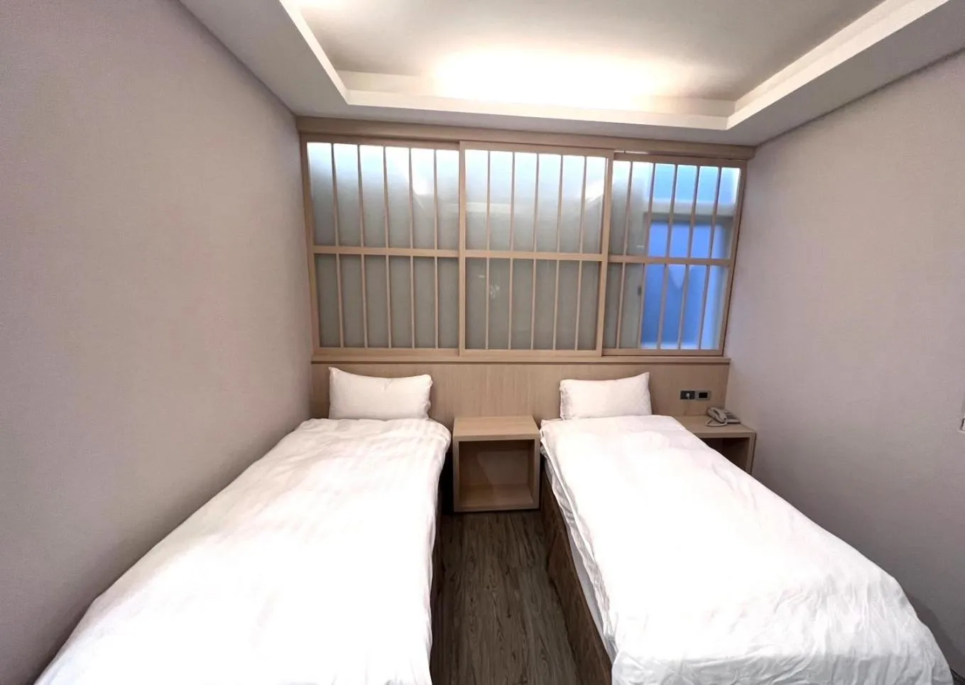 Bed in AOIKE Hot Spring Hotel