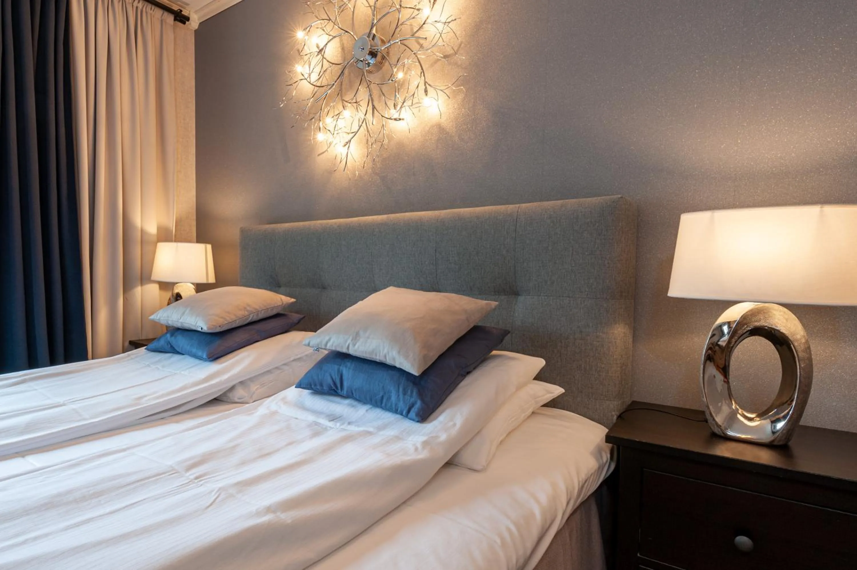 Bed in Kjøbmandsgaarden Hotel