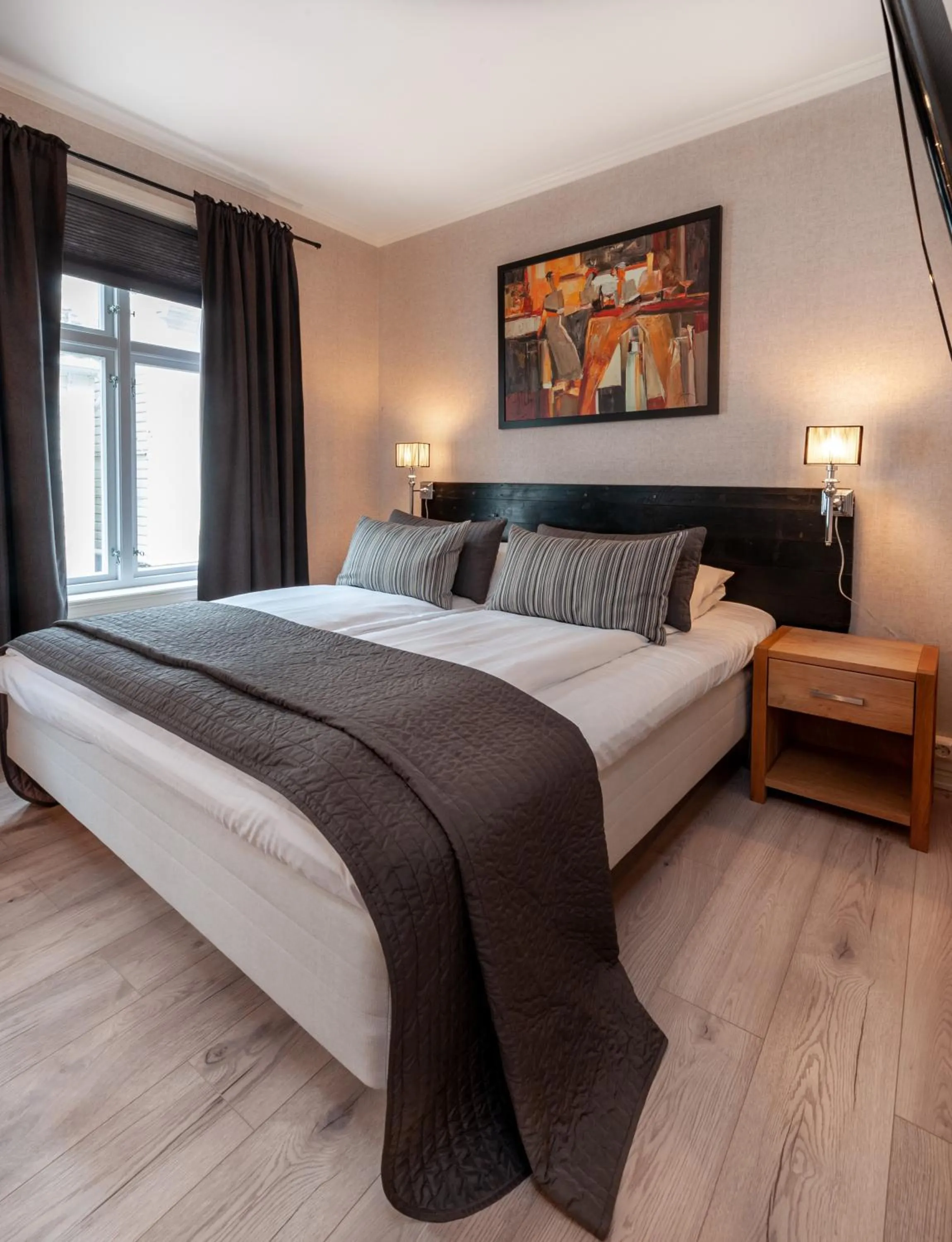 Bed in Kjøbmandsgaarden Hotel