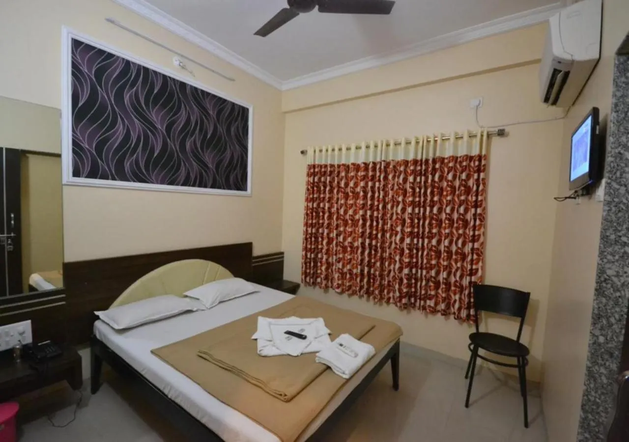 Bed in Hotel Yogiraj