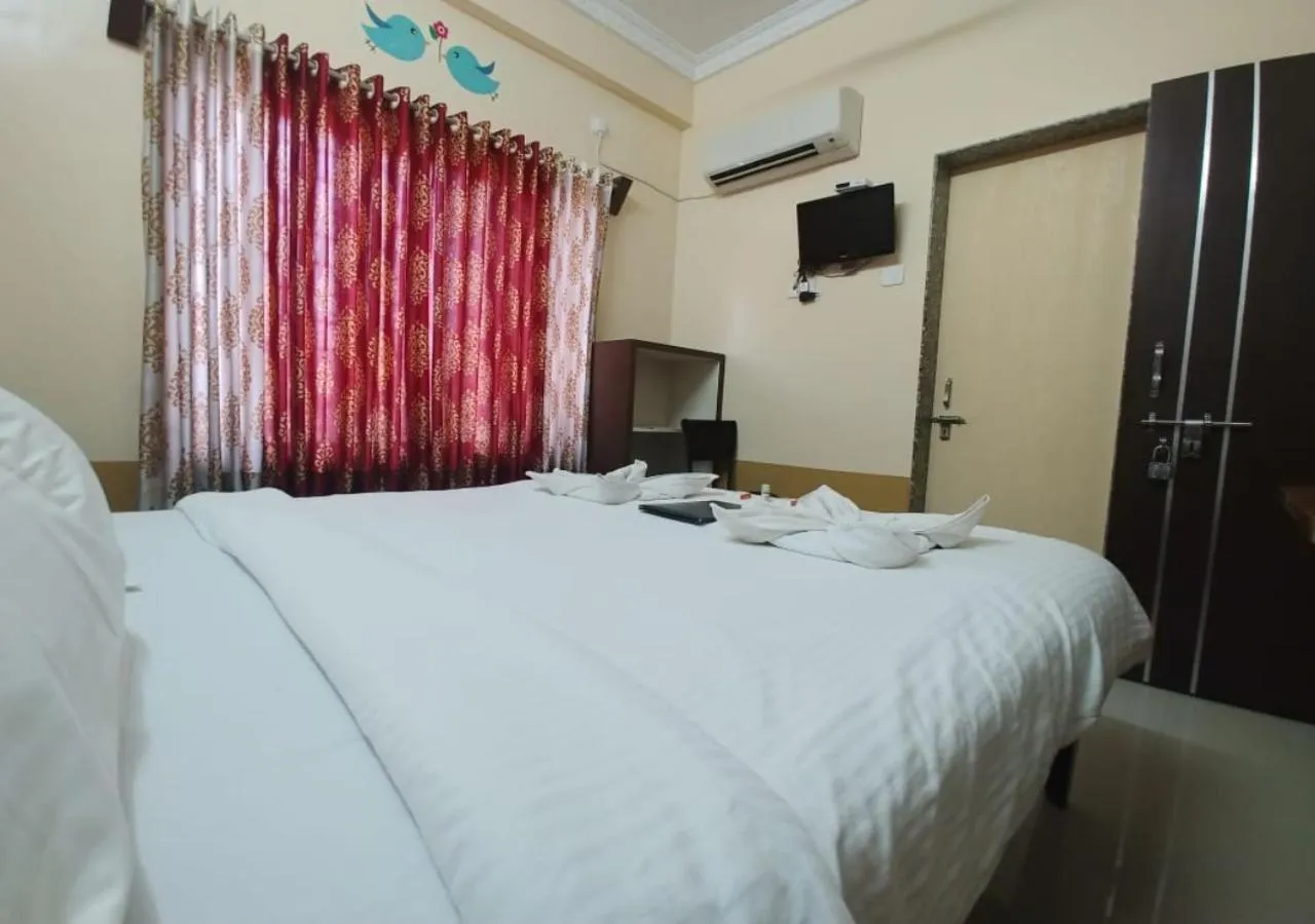 Bed in Hotel Yogiraj