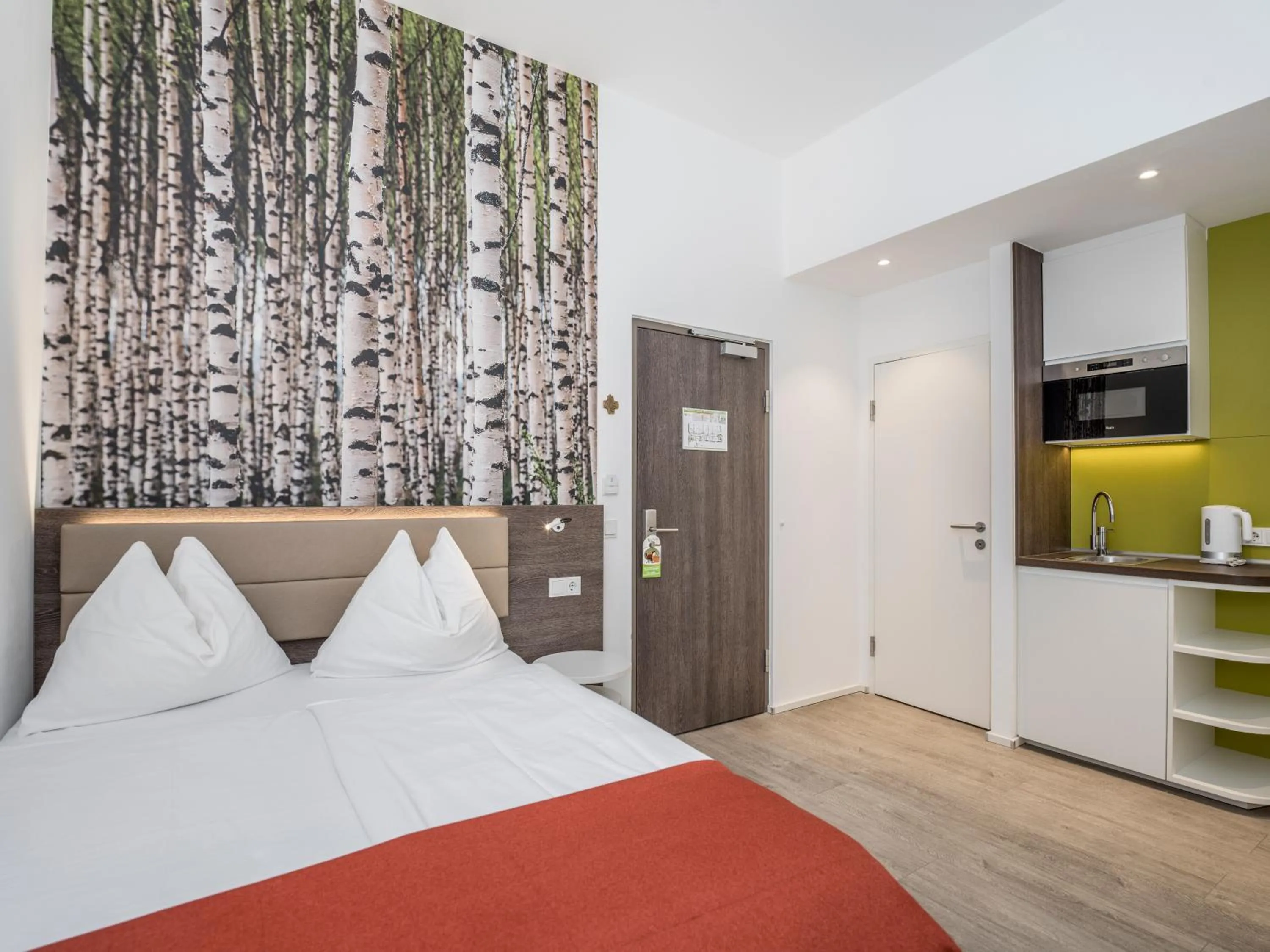 Bed in Eco Suite Hotel