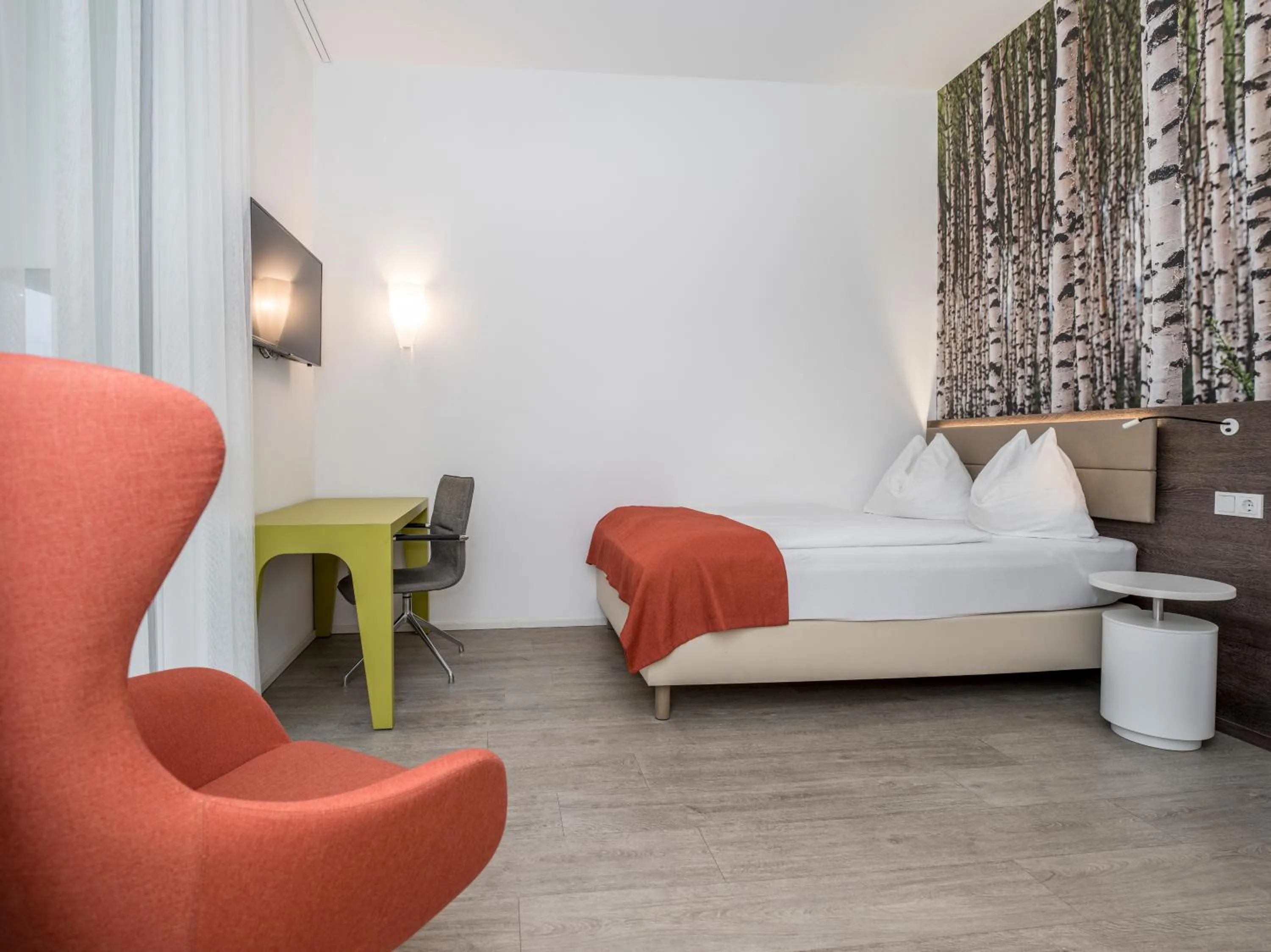 Bed in Eco Suite Hotel