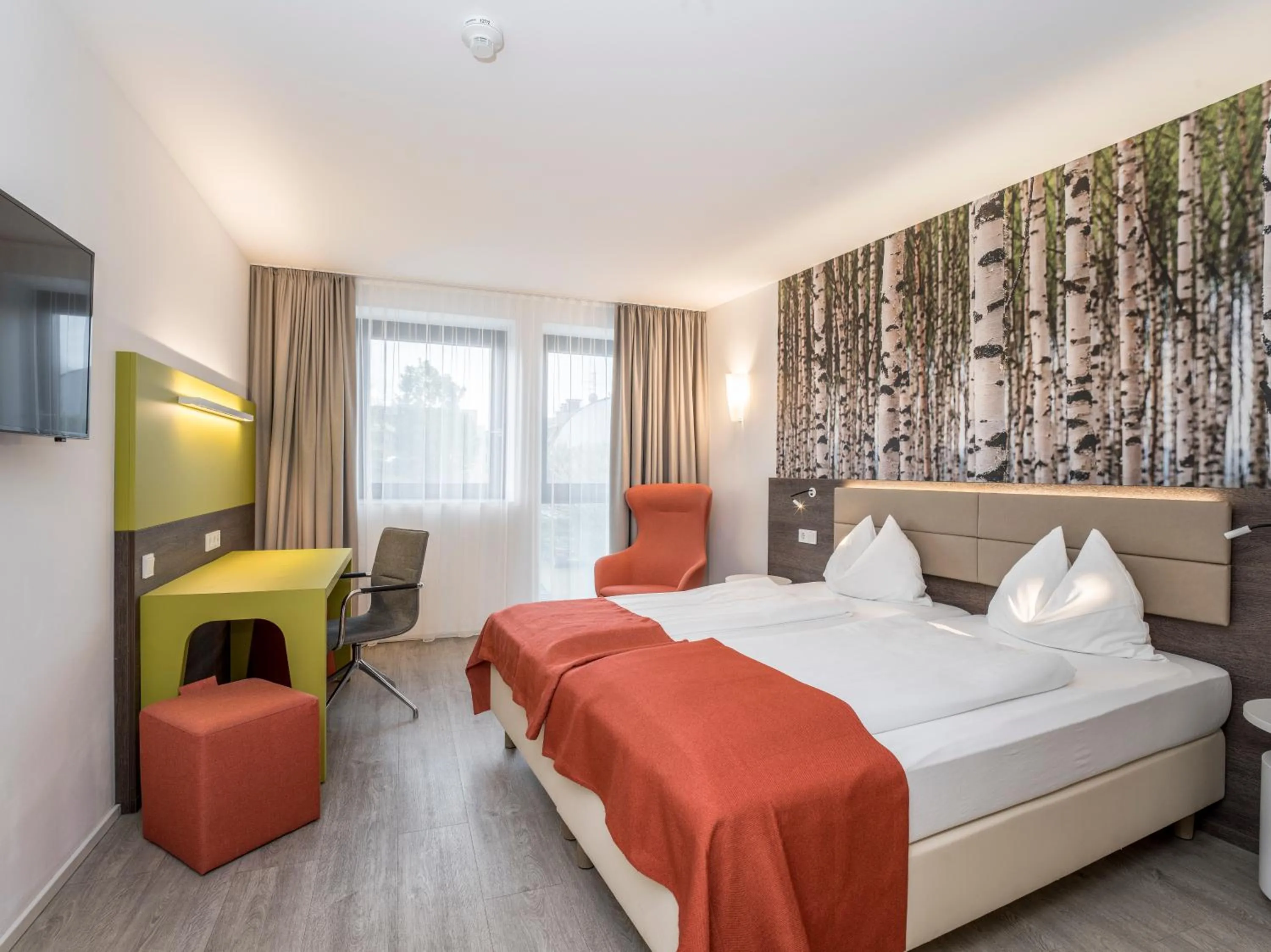 Bed in Eco Suite Hotel