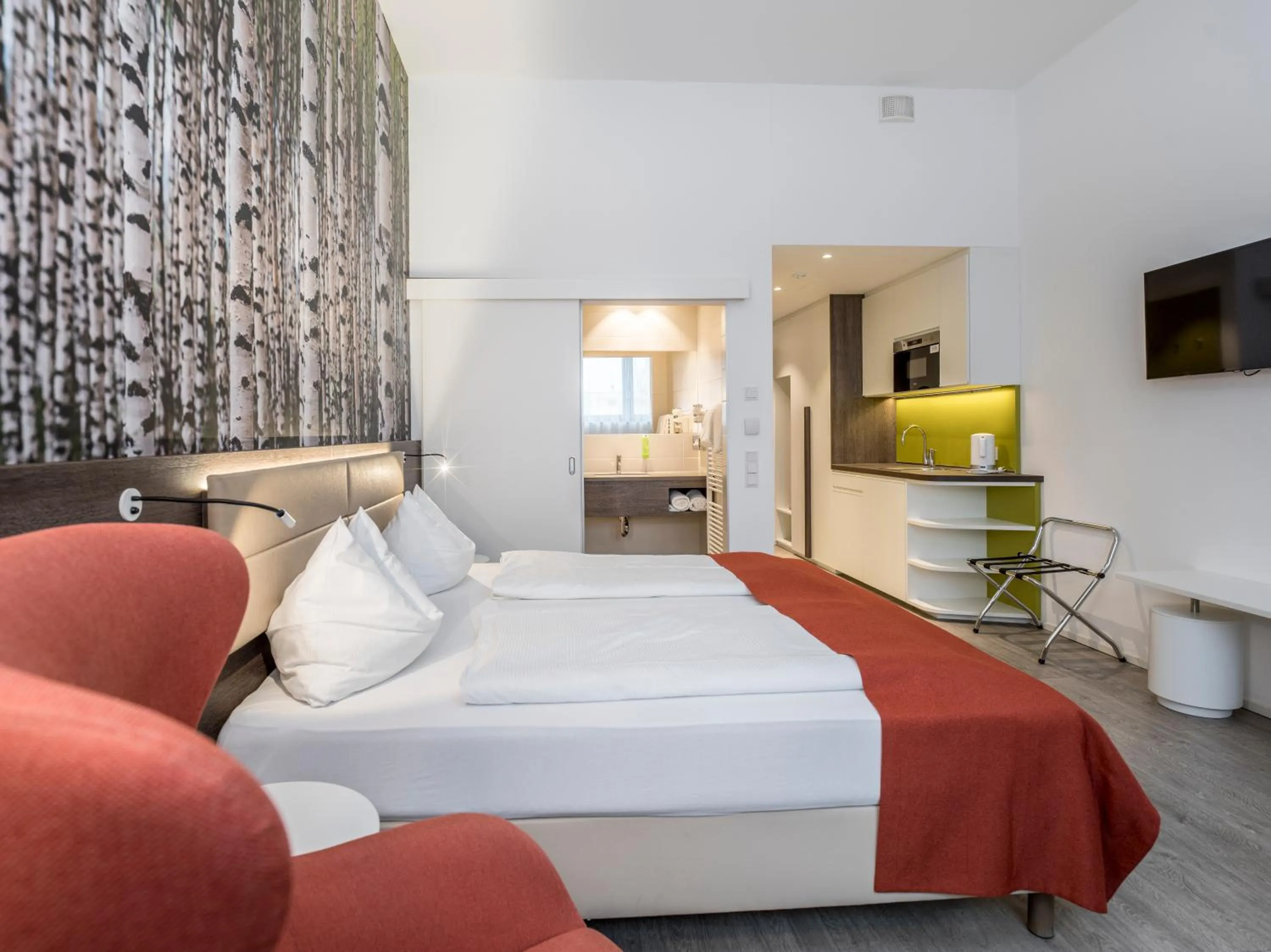 Bed in Eco Suite Hotel