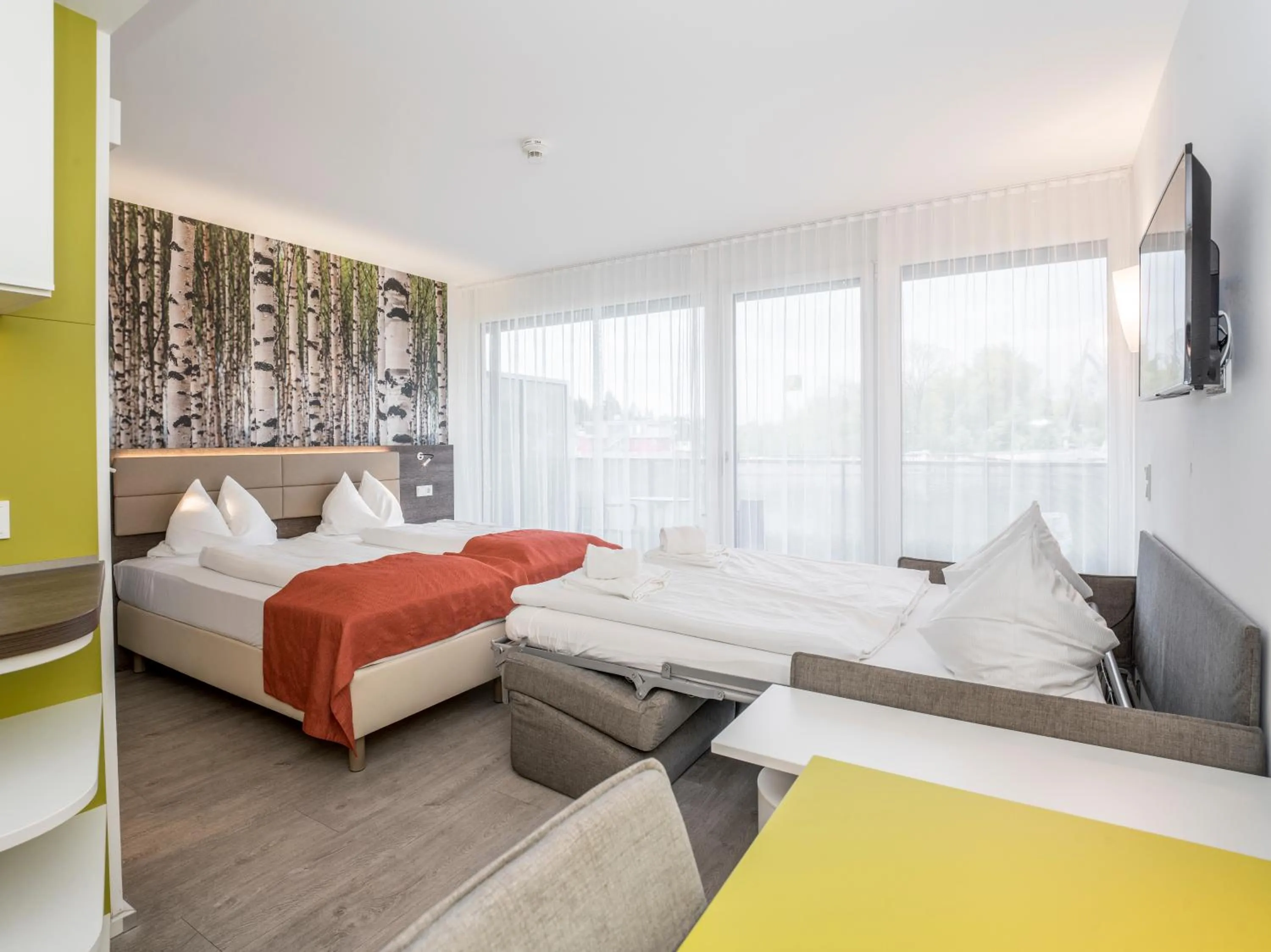 Bed in Eco Suite Hotel