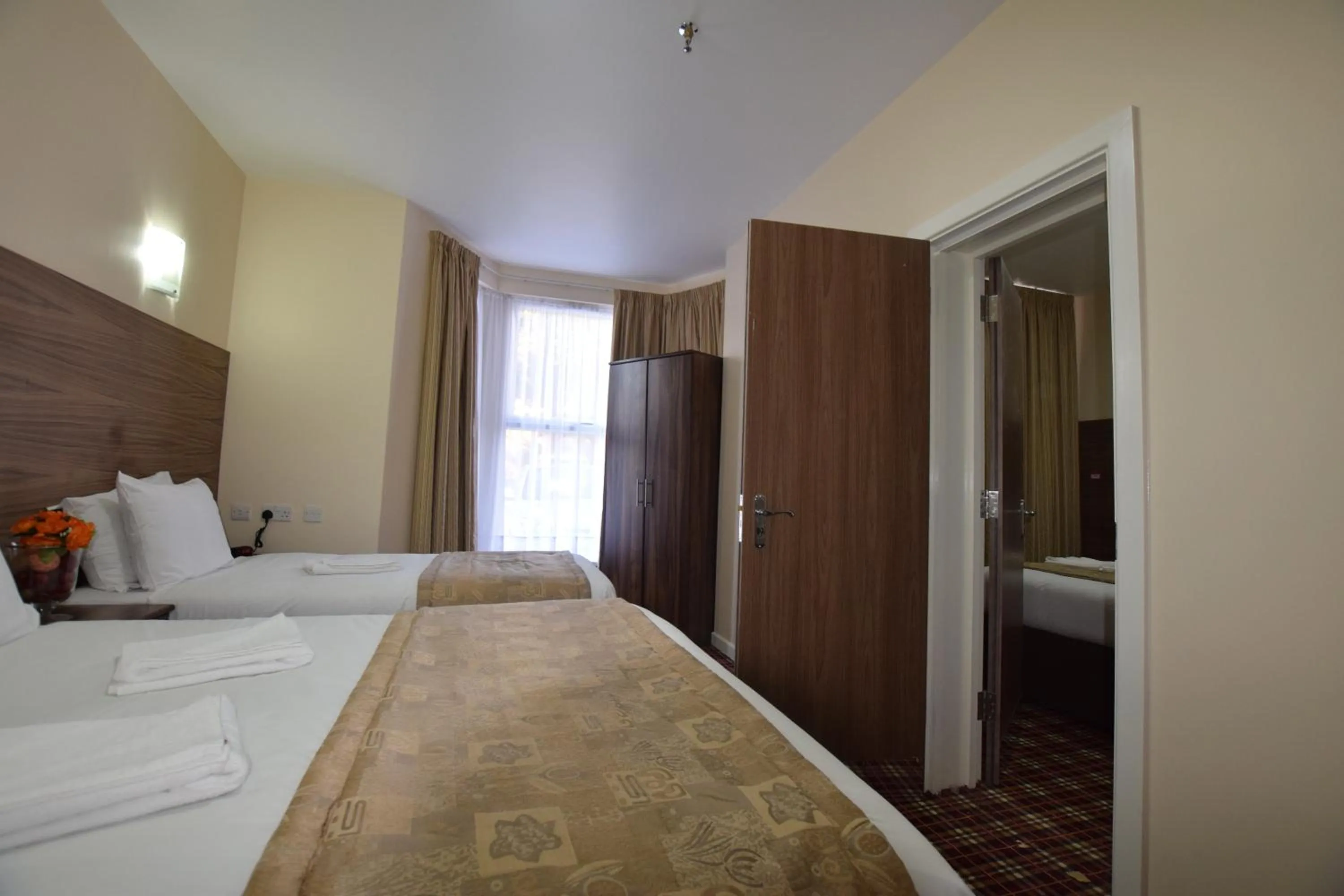 Photo of the whole room, Bed in Lucky 8 Hotel