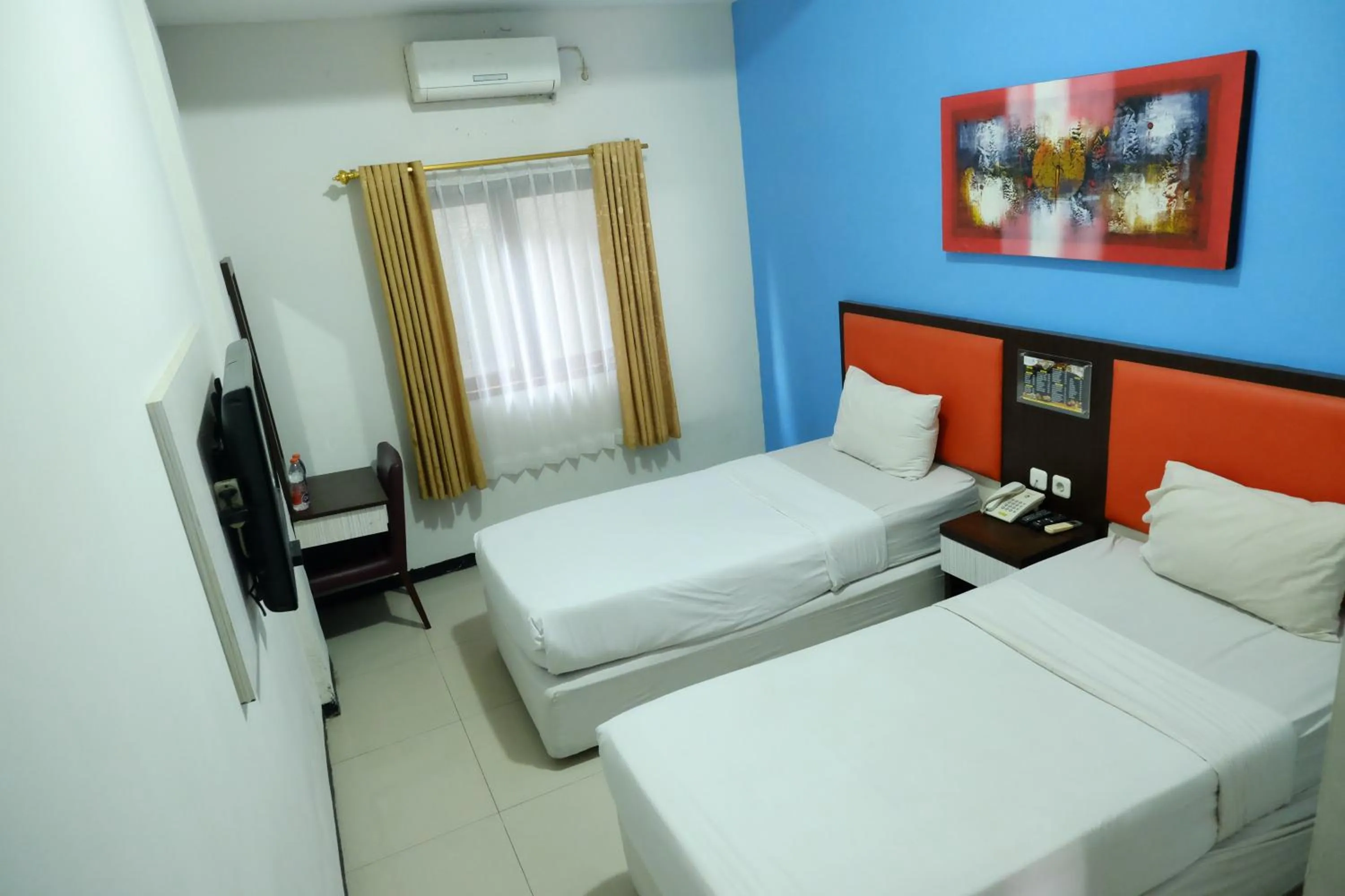 Bed in Sarila Hotel Solo