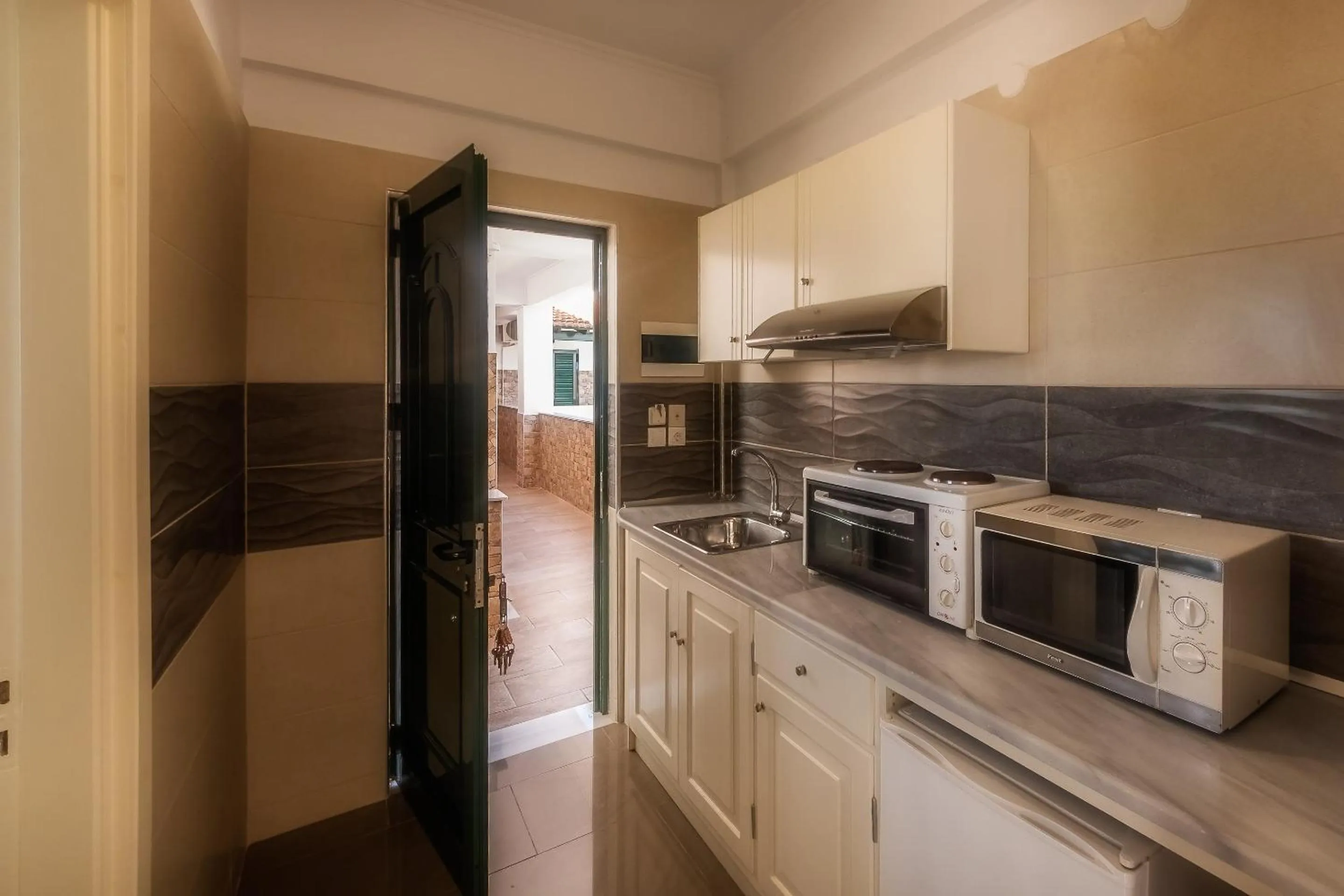 Kitchen or kitchenette in Chandris Apartments