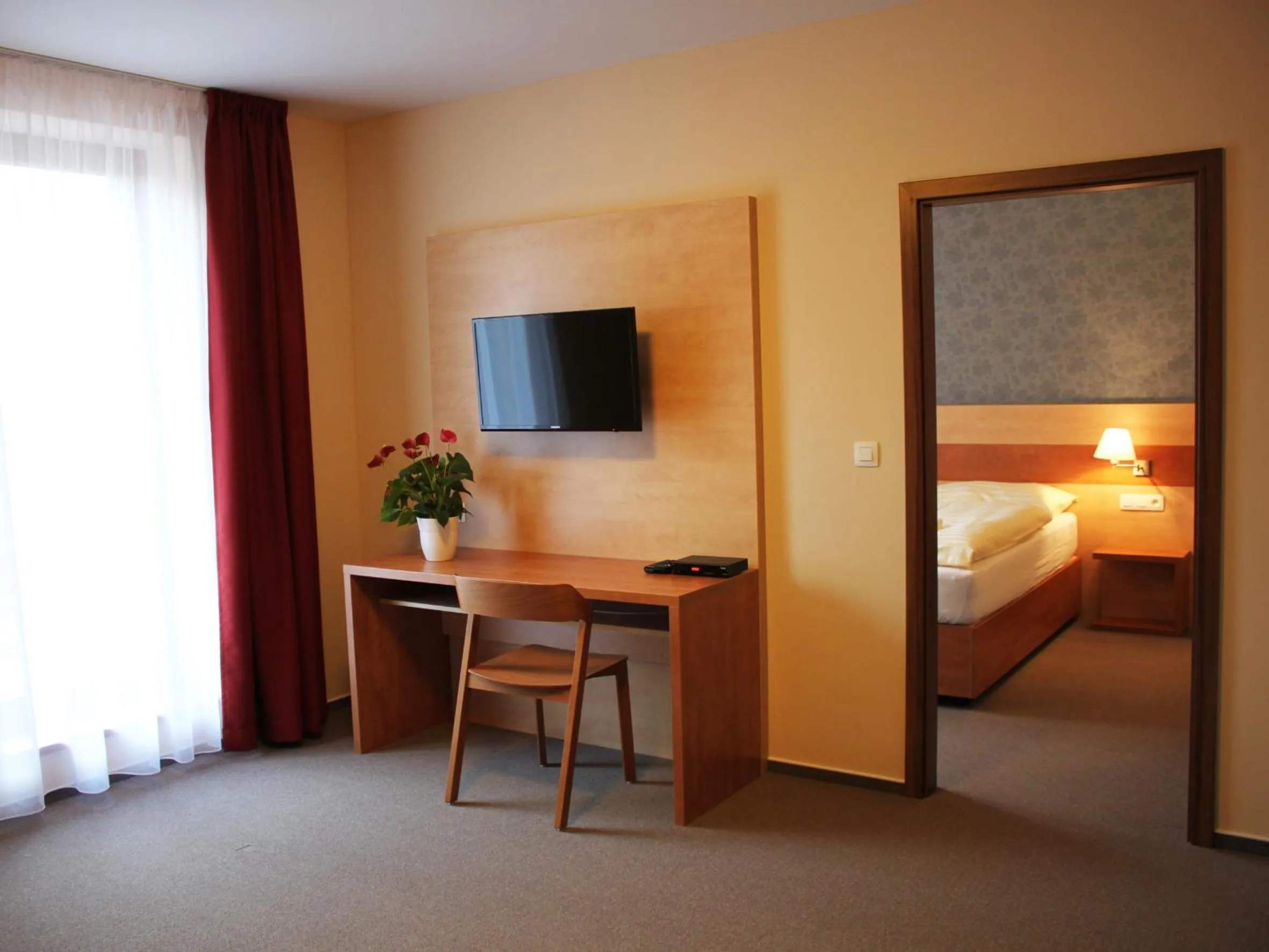 Living room, Bed in Hotel Toč