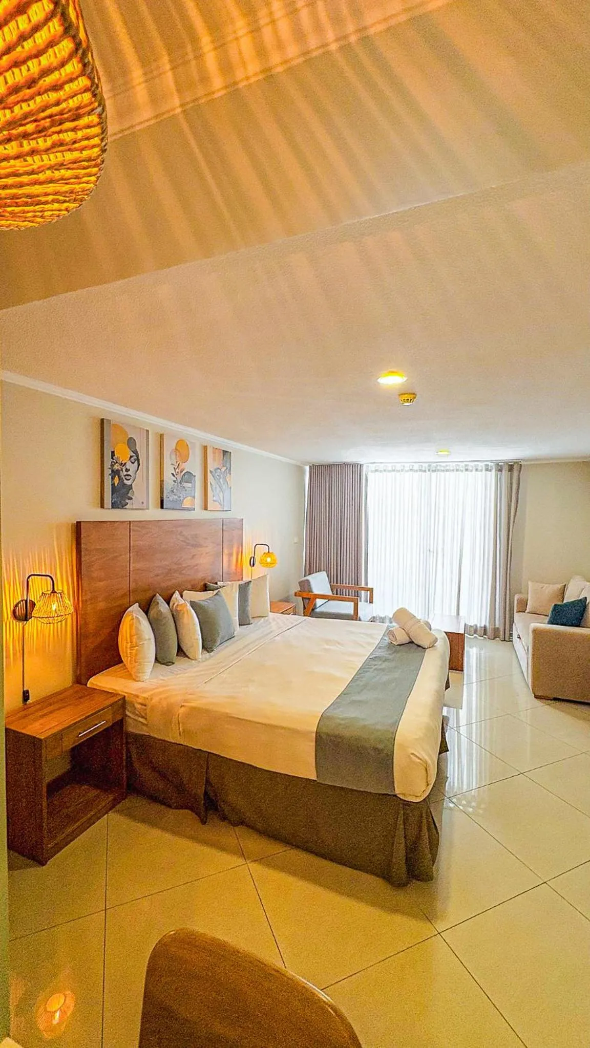 Bed in Majestic City Suites & Beach Hotel