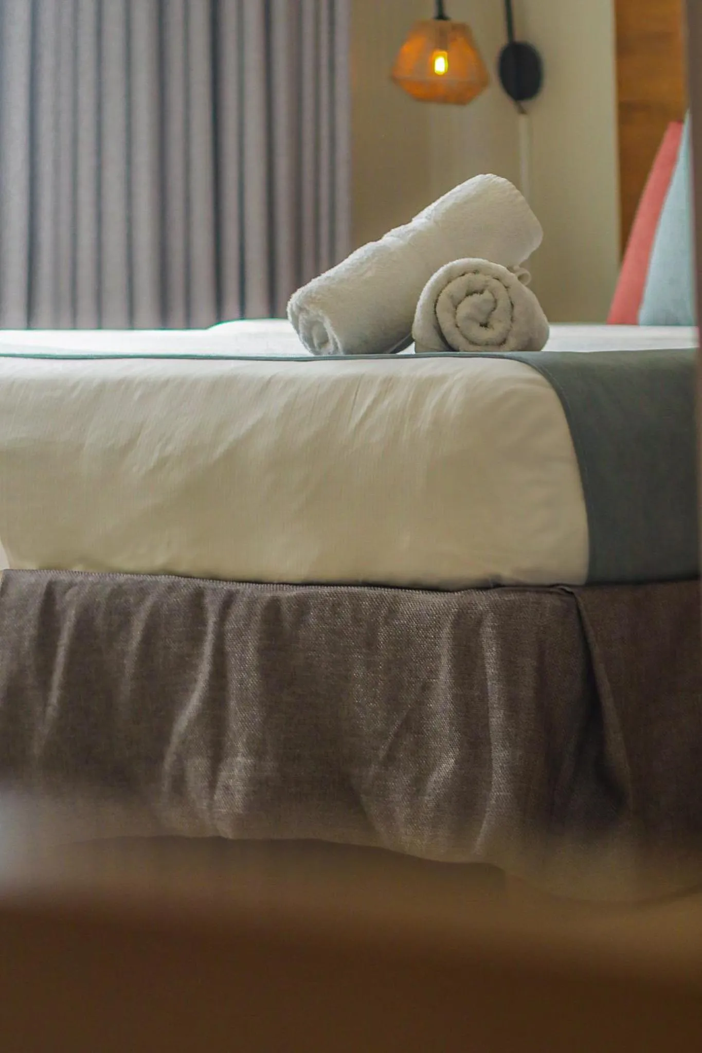 Bed in Majestic City Suites & Beach Hotel