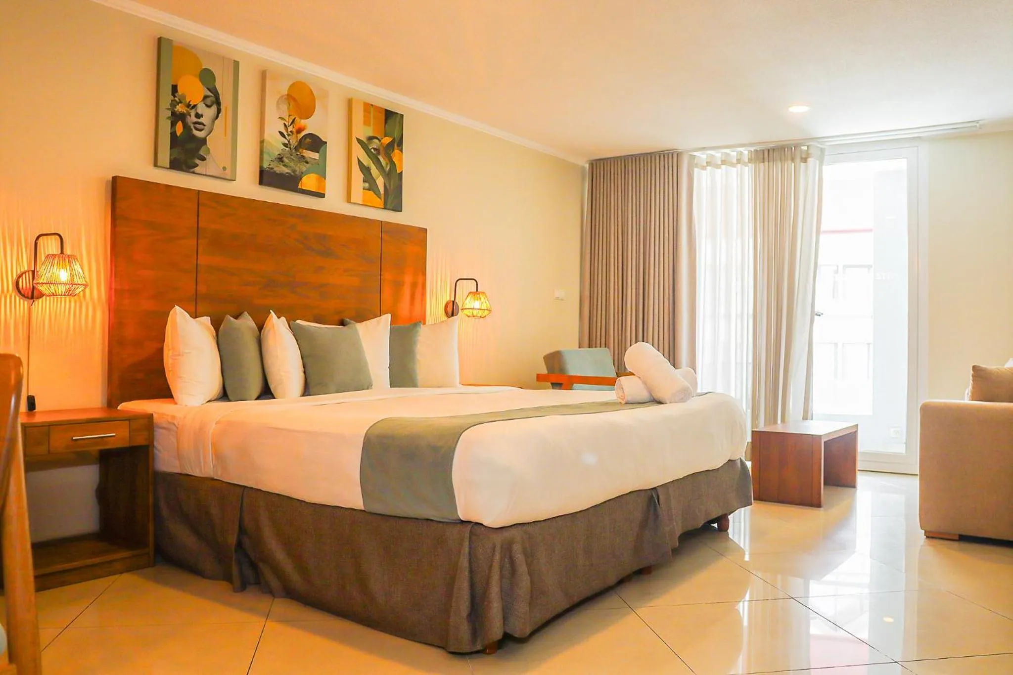 Bed in Majestic City Suites & Beach Hotel