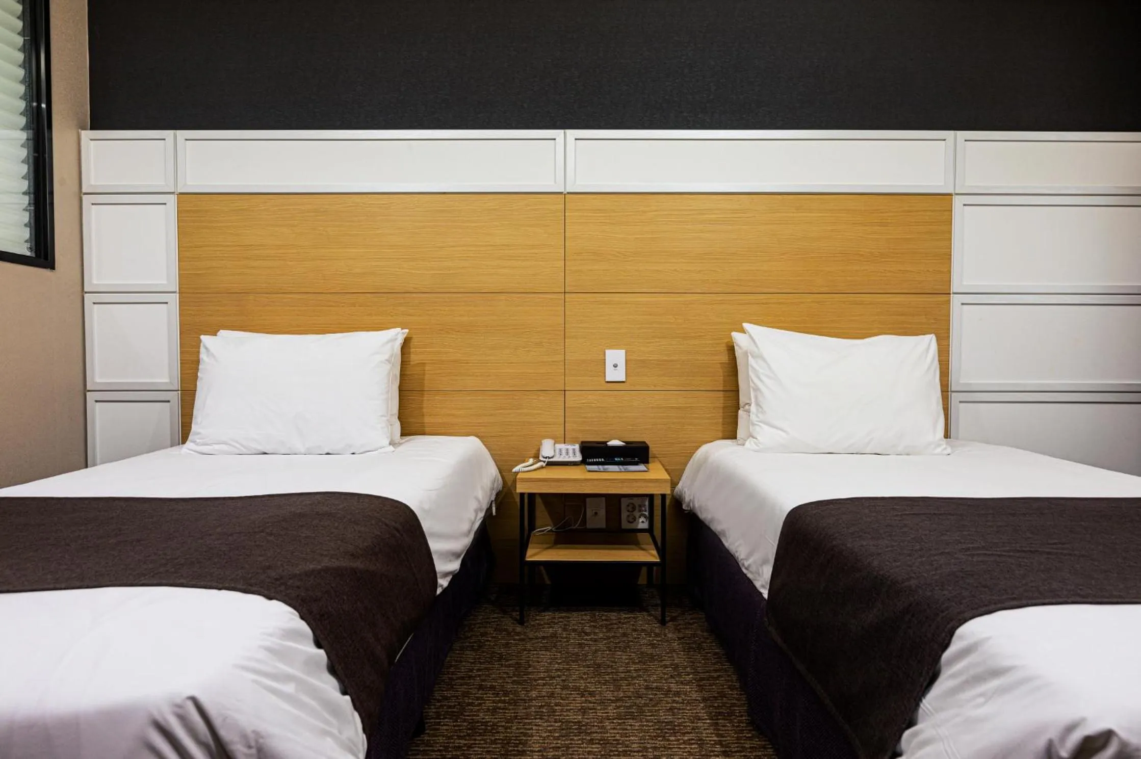 Bed in Eastern Hotel Jeju