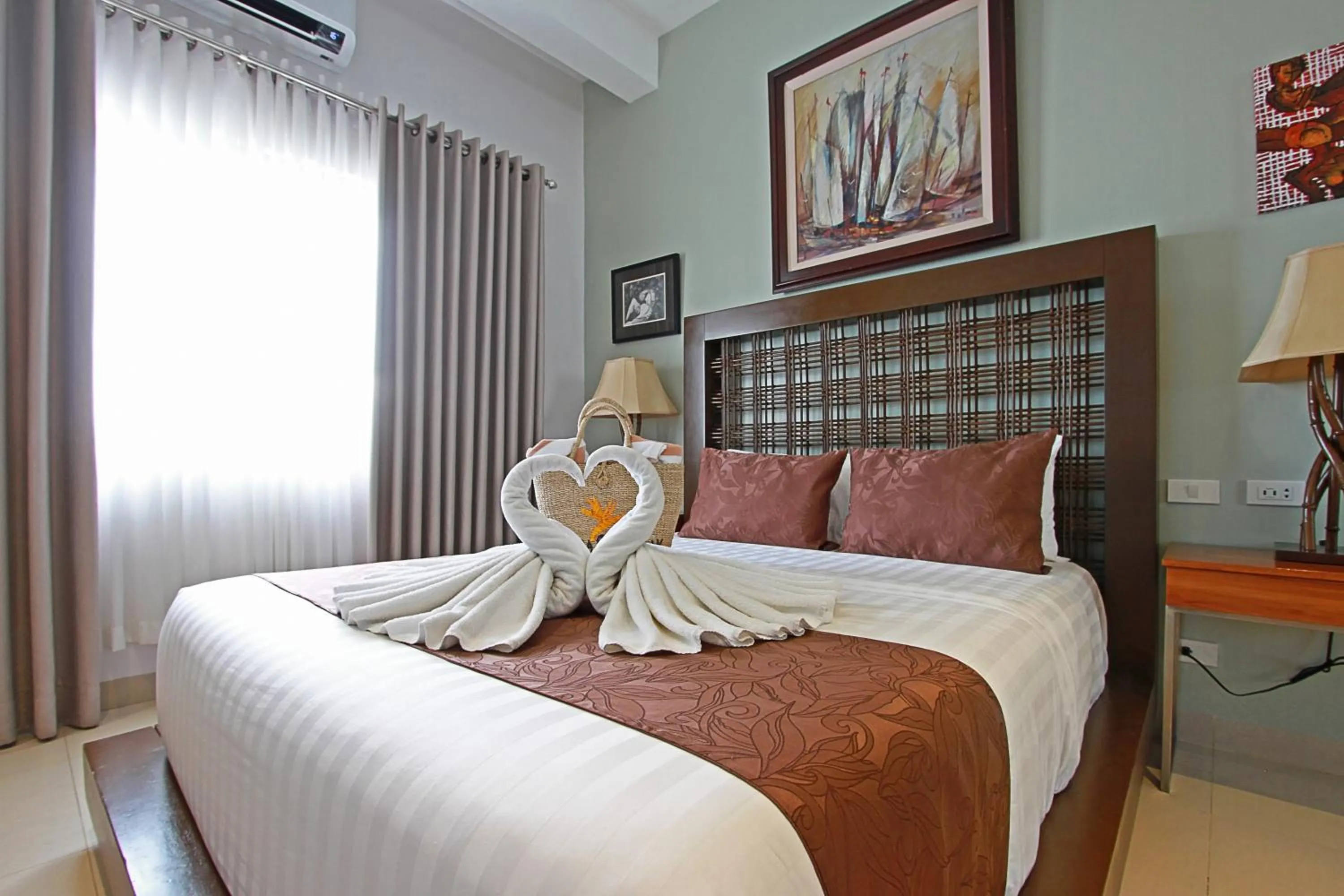 Bed in Aloha Boracay Hotel