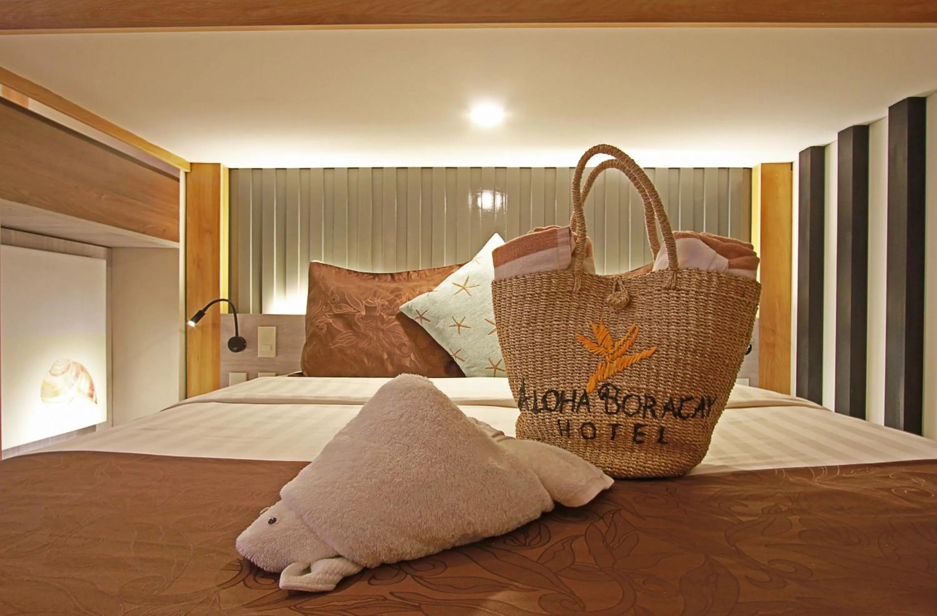 Bed in Aloha Boracay Hotel