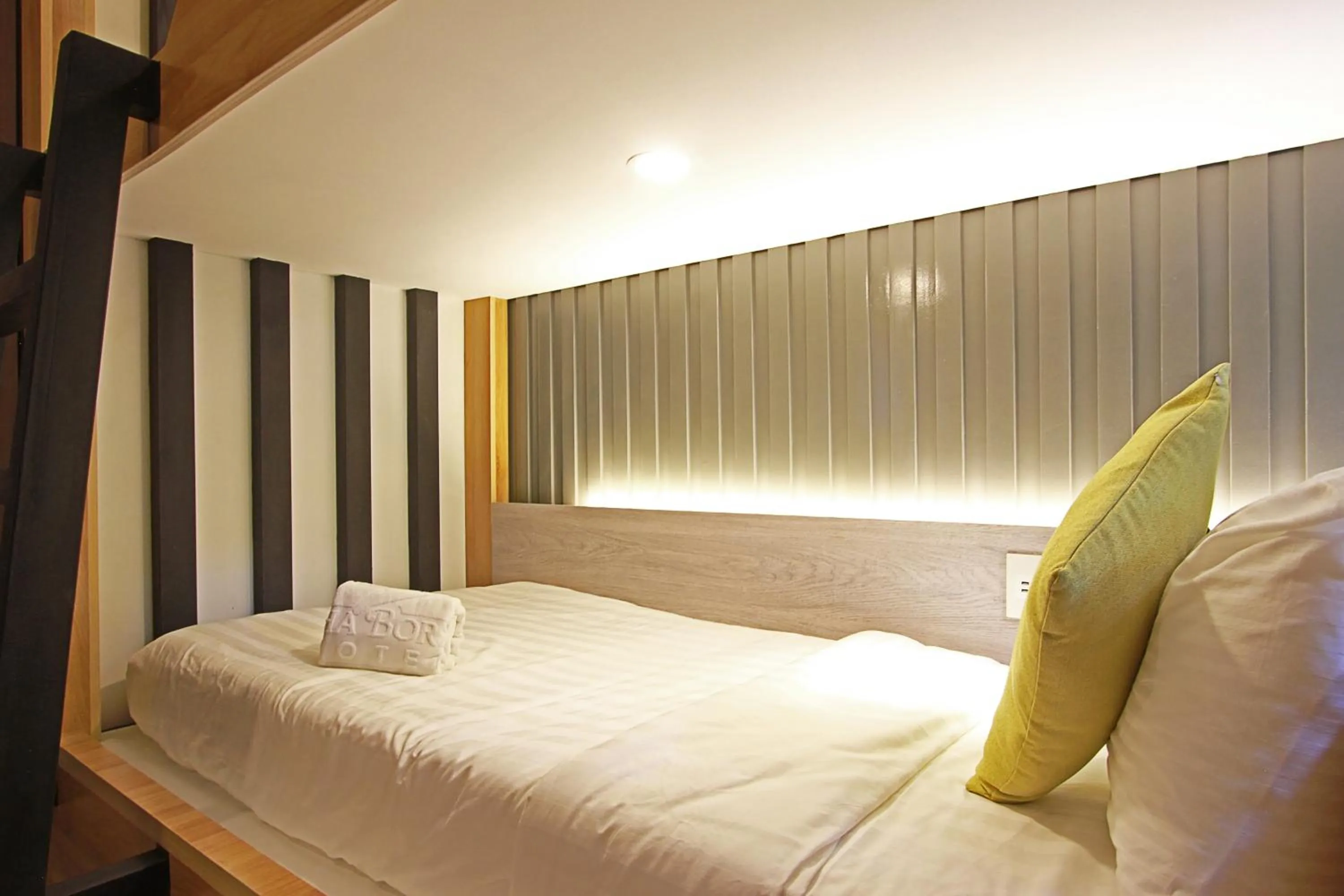 Bed in Aloha Boracay Hotel