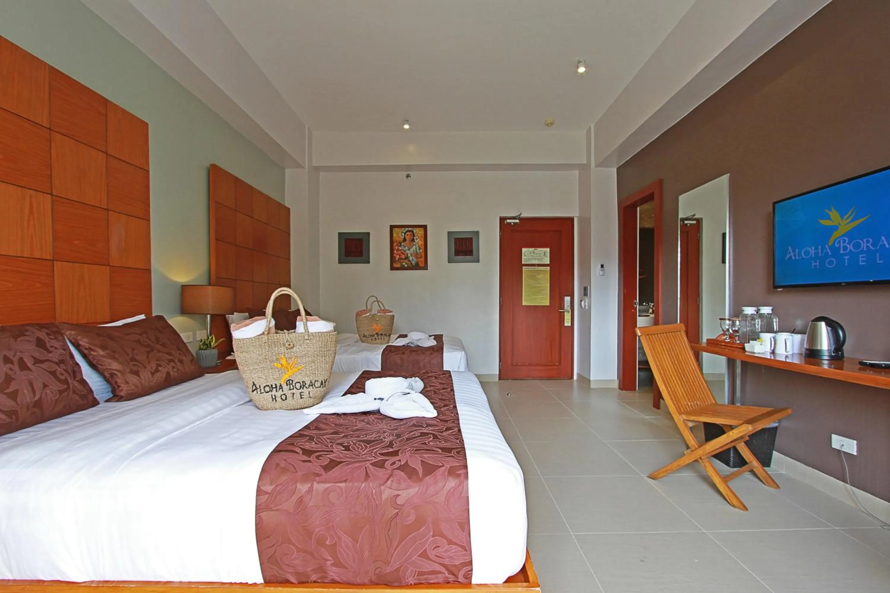 Photo of the whole room, Bed in Aloha Boracay Hotel