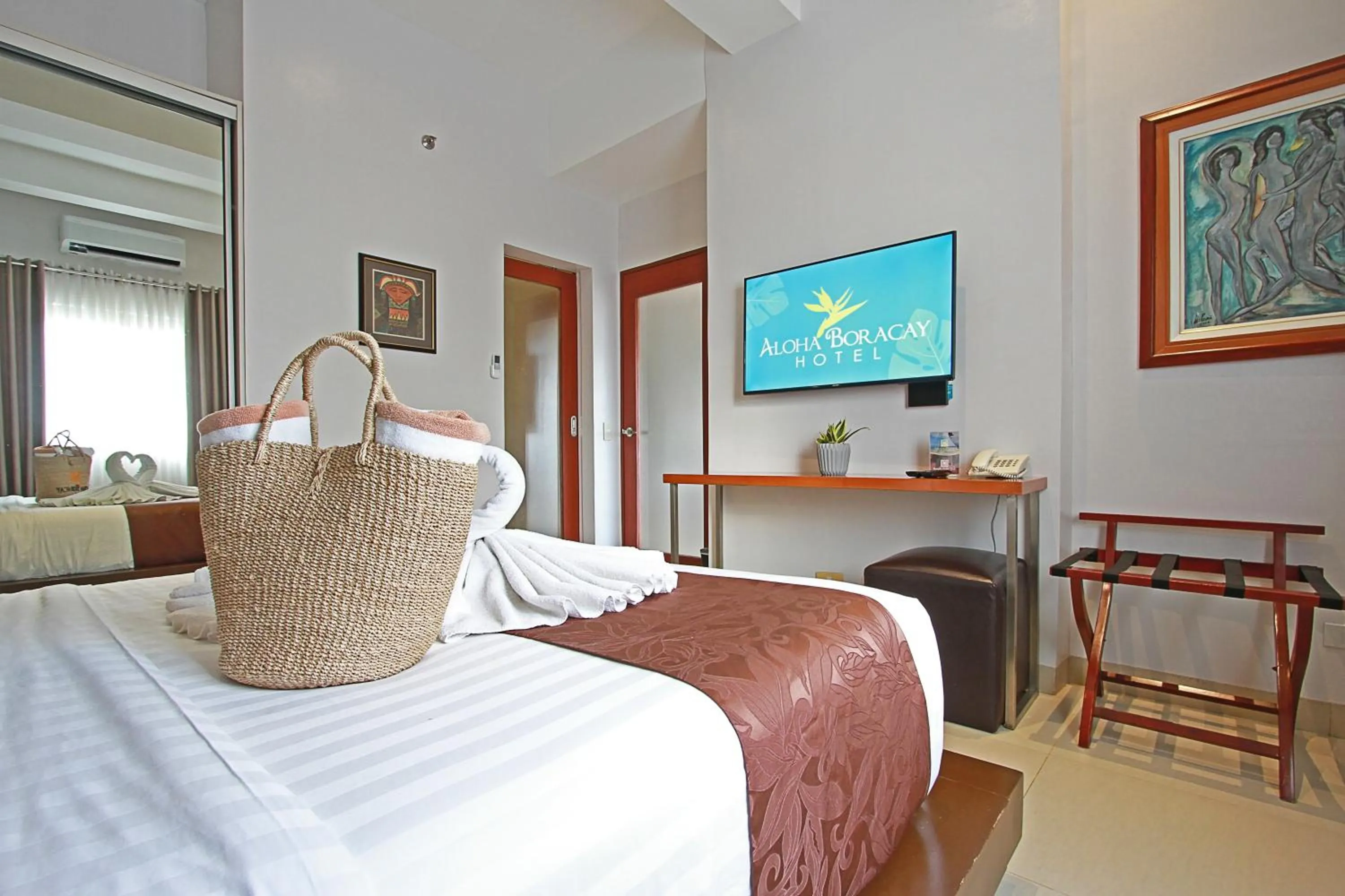 Bed in Aloha Boracay Hotel