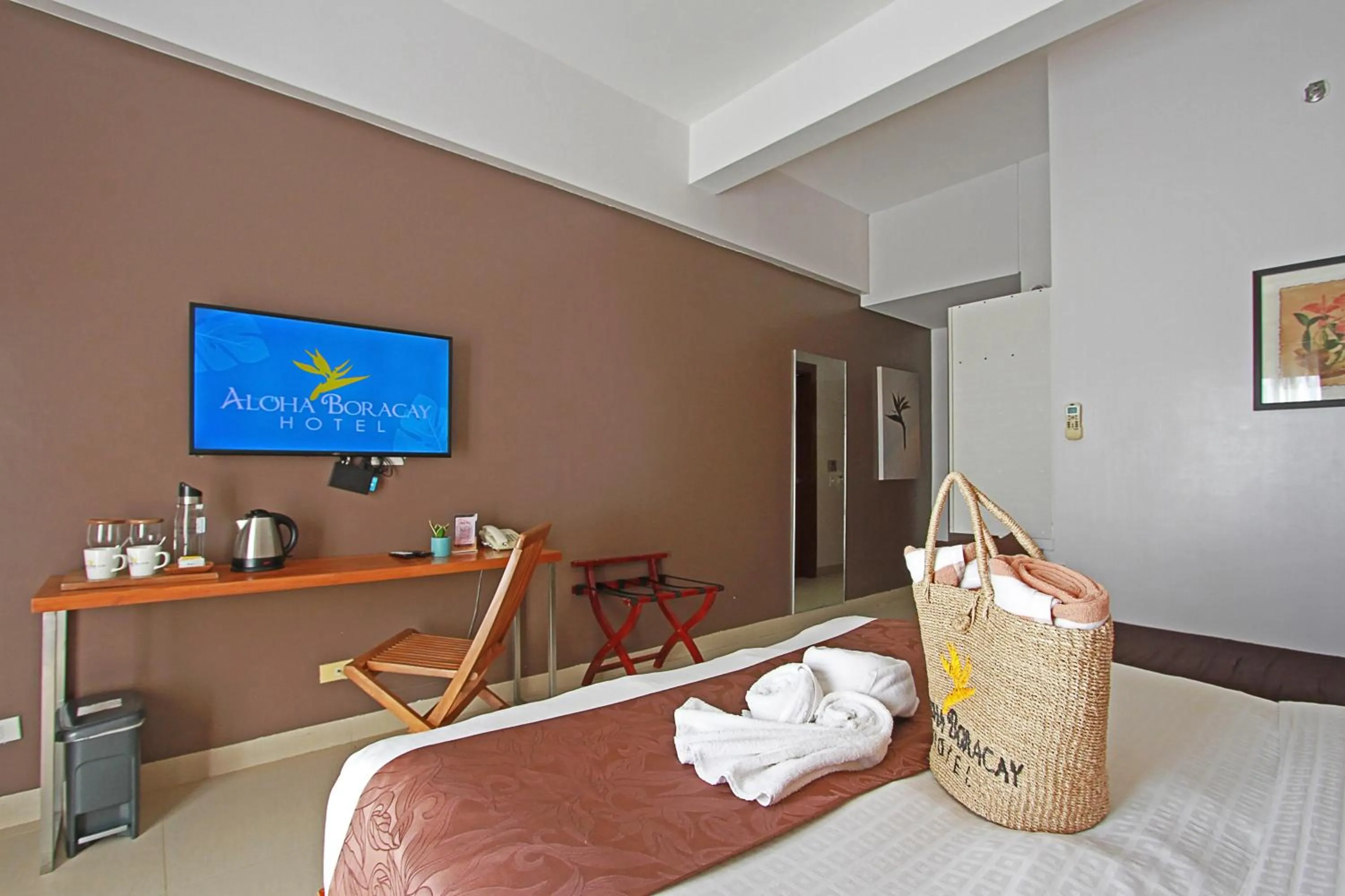 TV and multimedia, Bed in Aloha Boracay Hotel