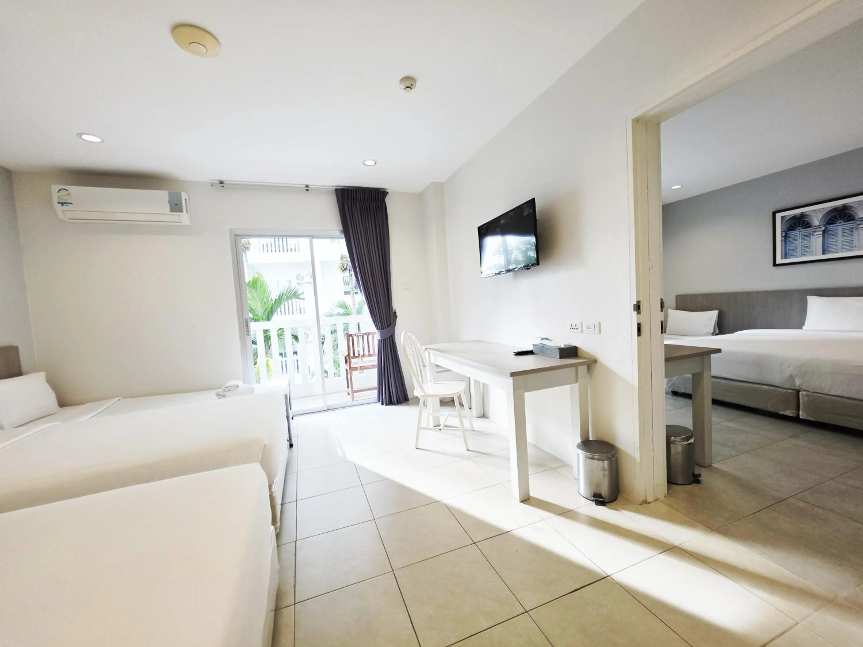 TV and multimedia, Bed in Recenta Phuket Suanluang by Deevana