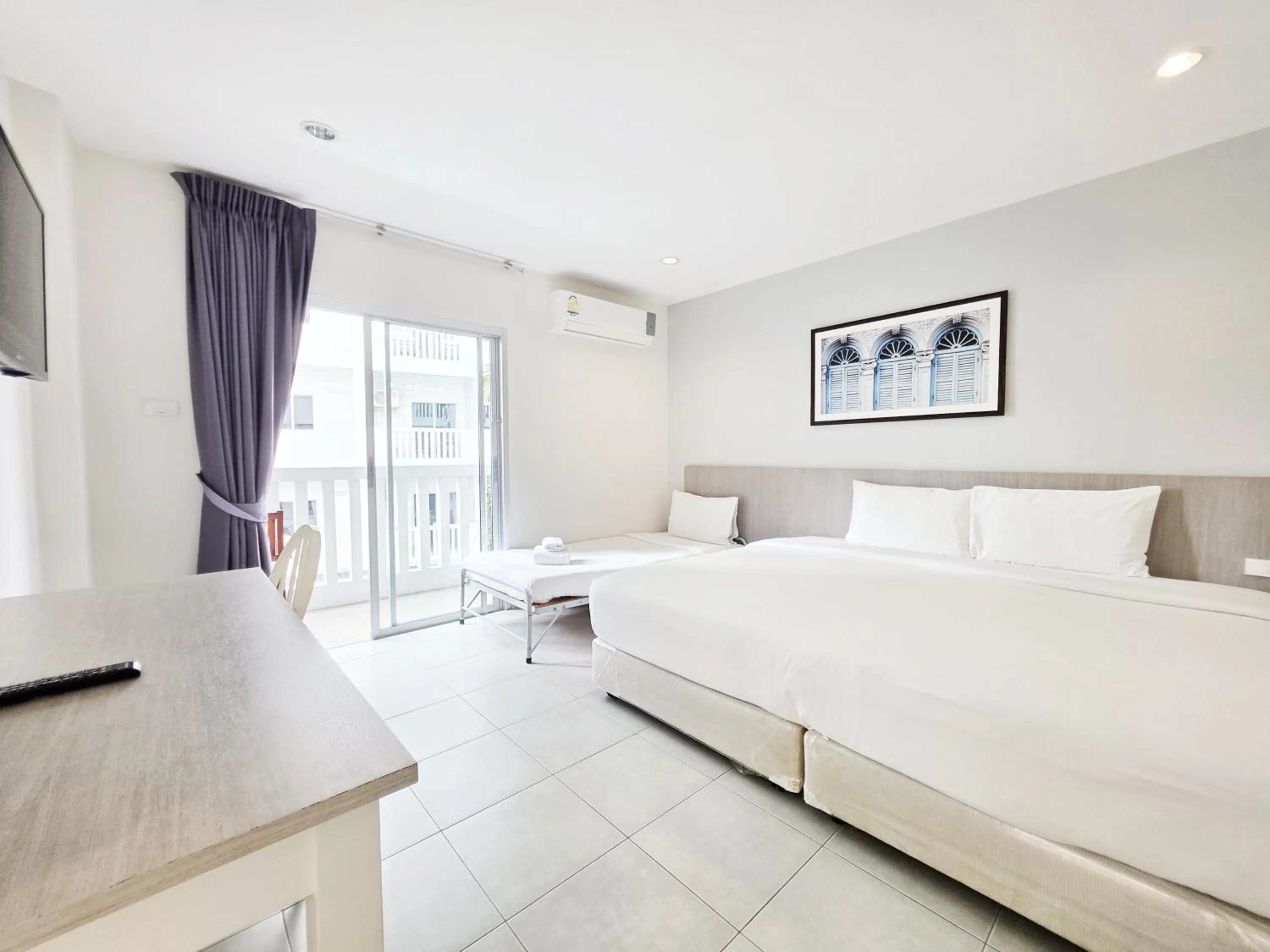 TV and multimedia, Bed in Recenta Phuket Suanluang by Deevana