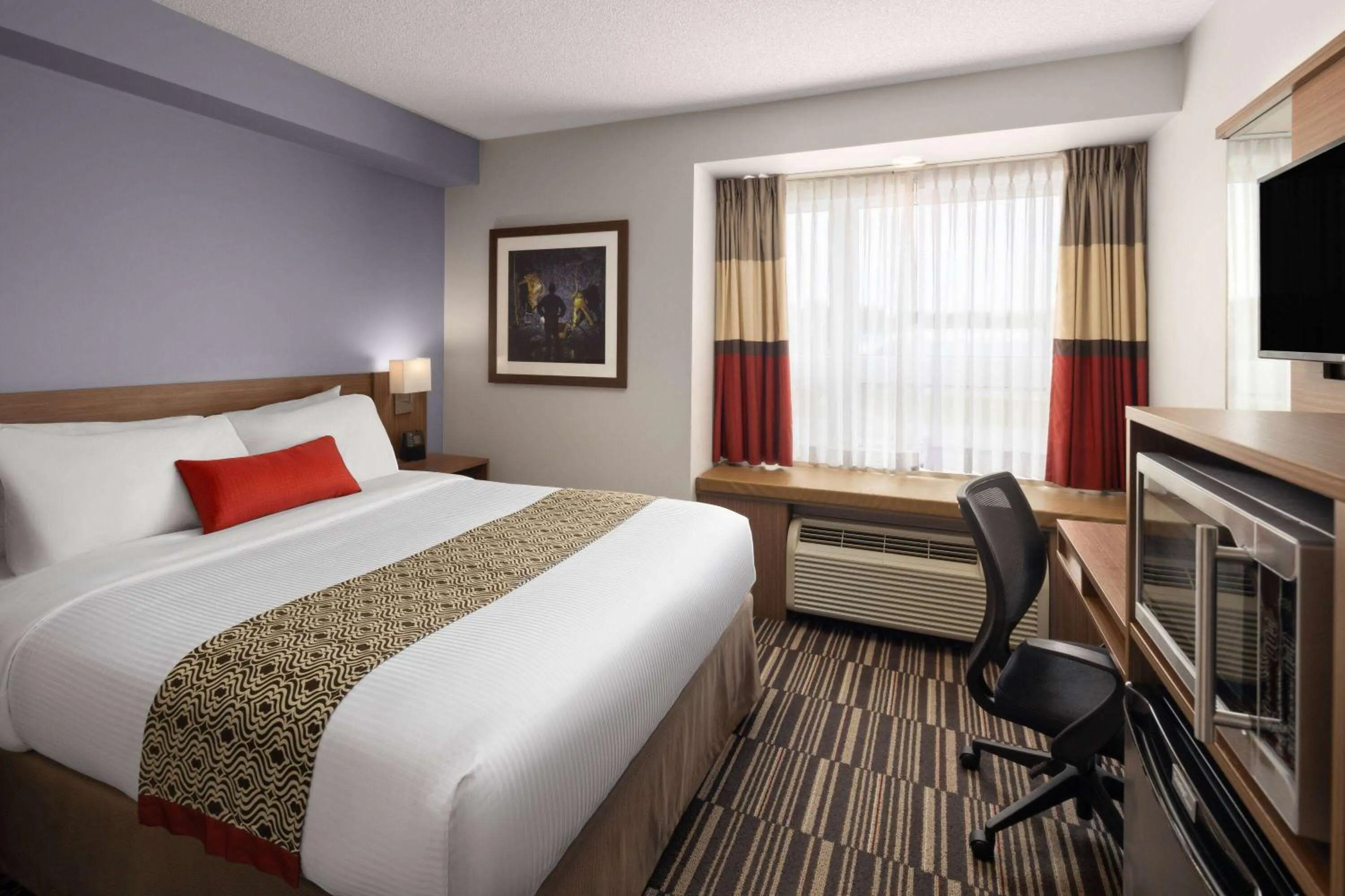Photo of the whole room, Bed in Microtel Inn & Suites by Wyndham Kirkland Lake