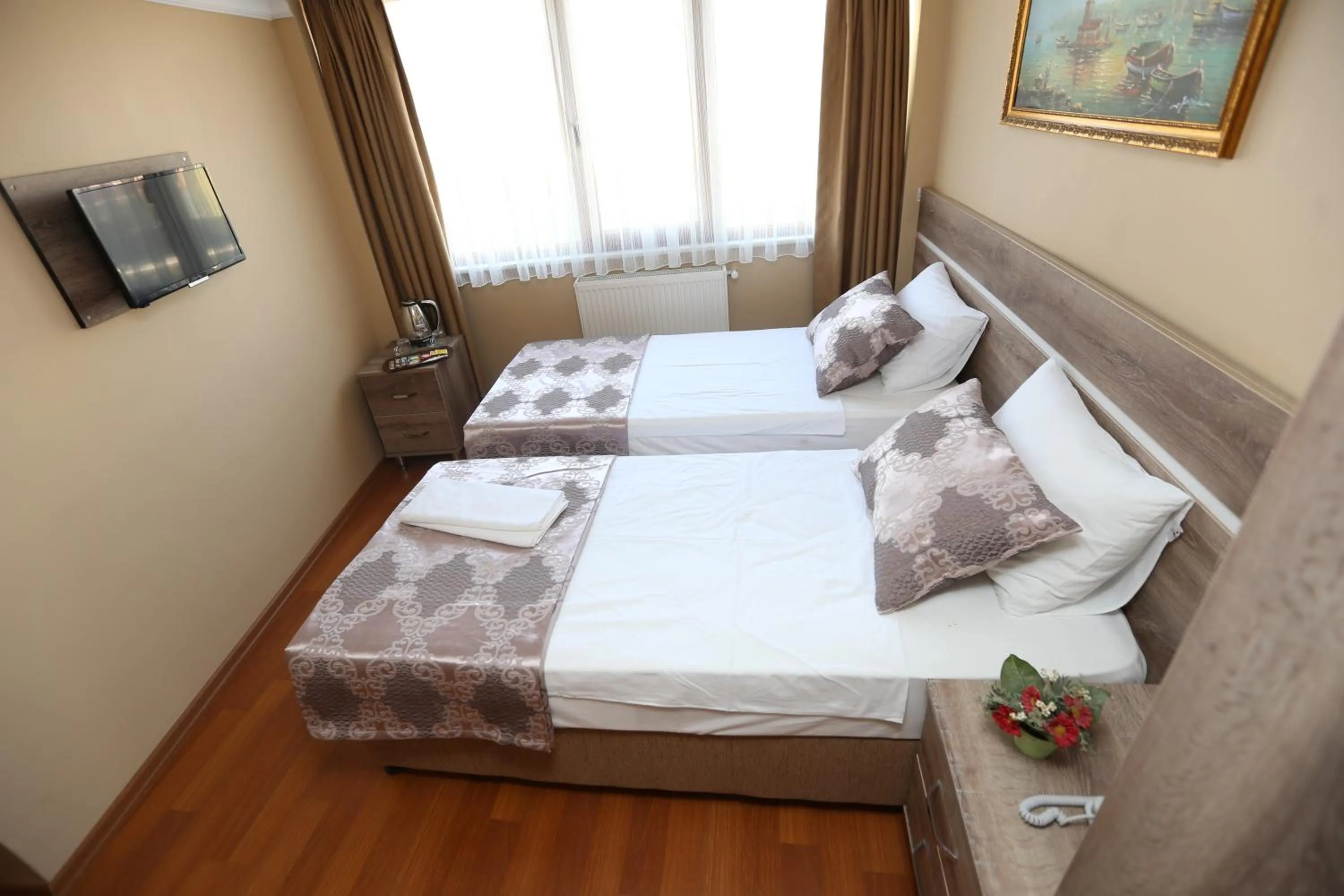 Bed in My Holiday Time Hotel