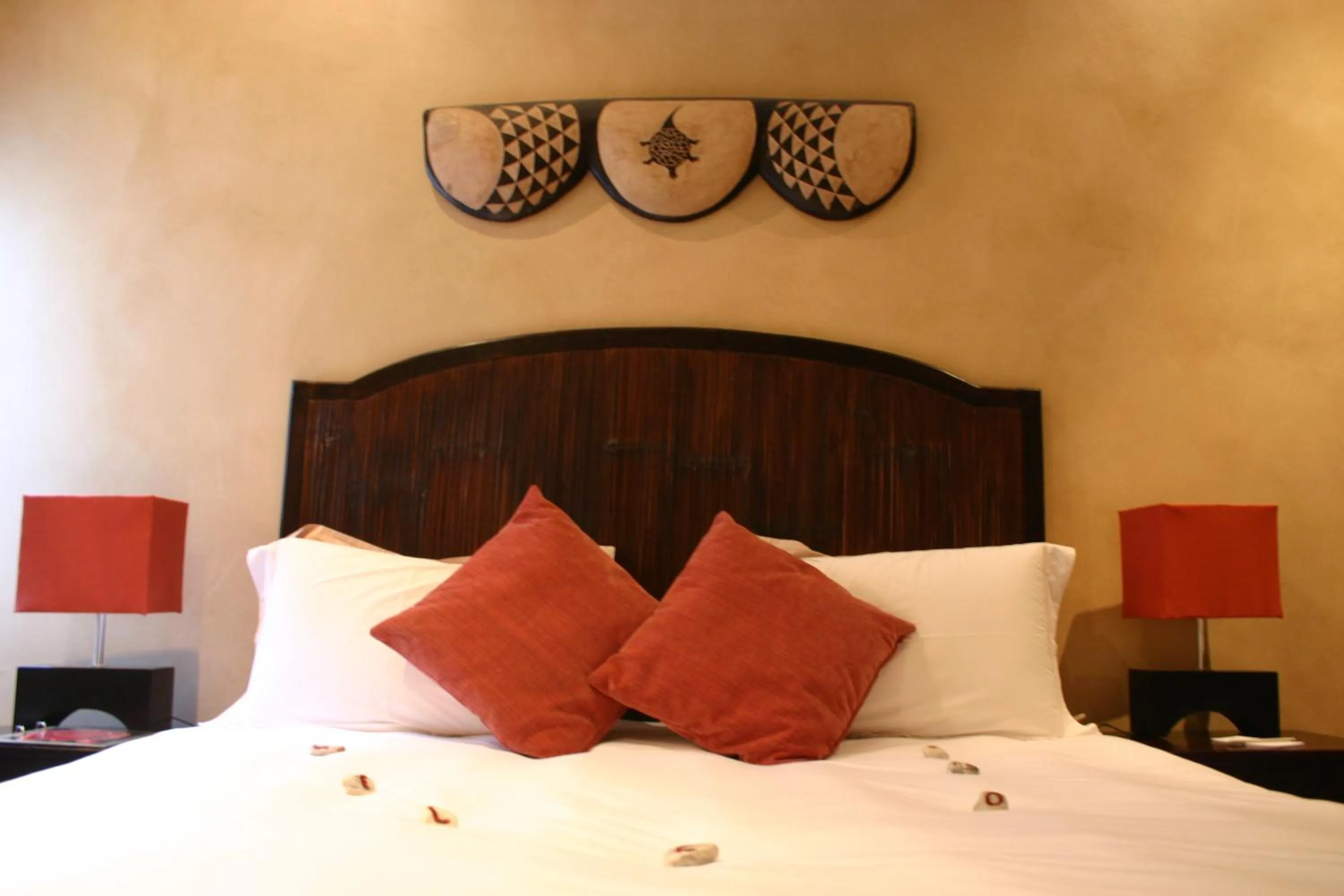 Bed in Jardin d'ébène Boutique Guesthouse