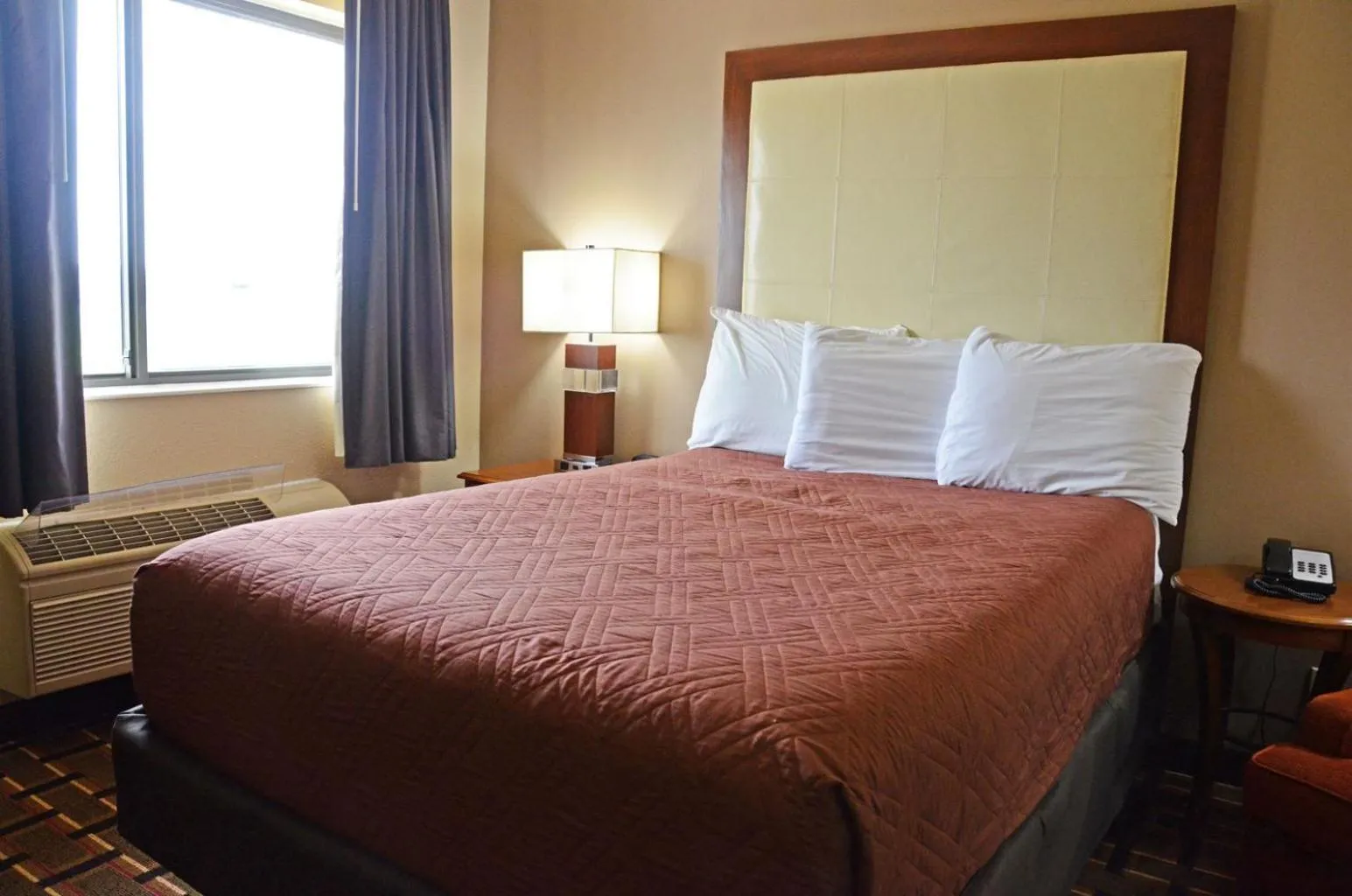 Bed in Heritage Grand Inn