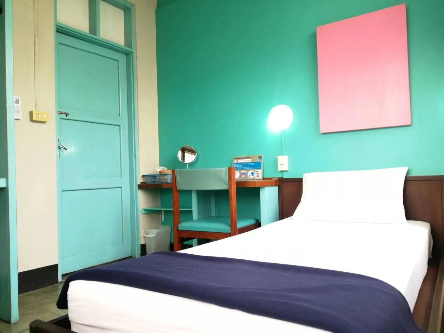 Bedroom, Bed in 60 Blue House