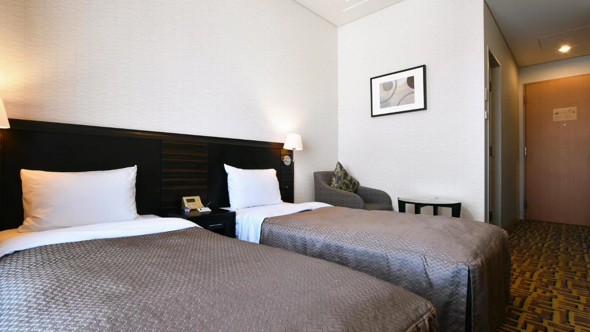 Bed in Okura Chiba Hotel