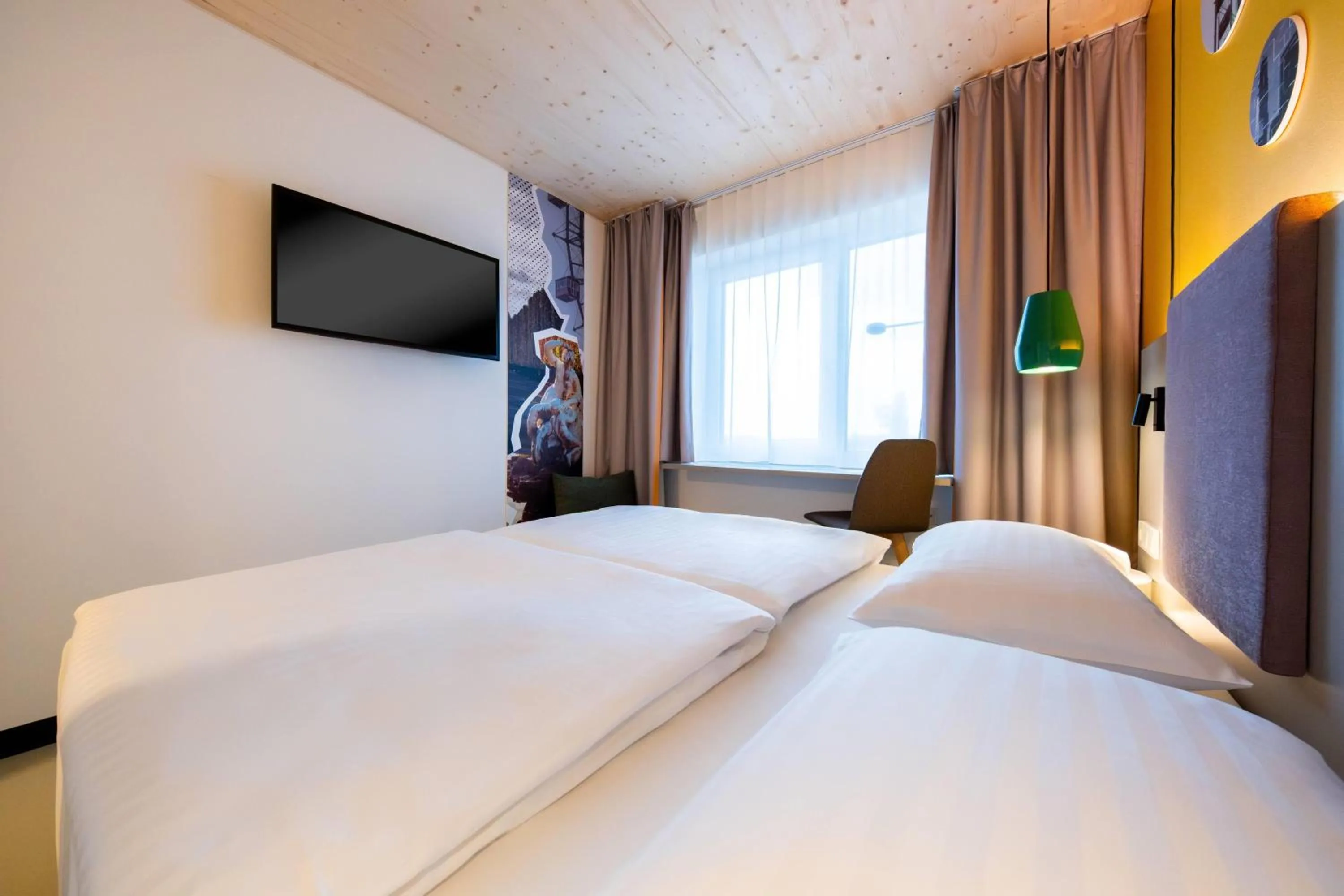 Photo of the whole room, Bed in Vienna House Easy by Wyndham Vienna Airport