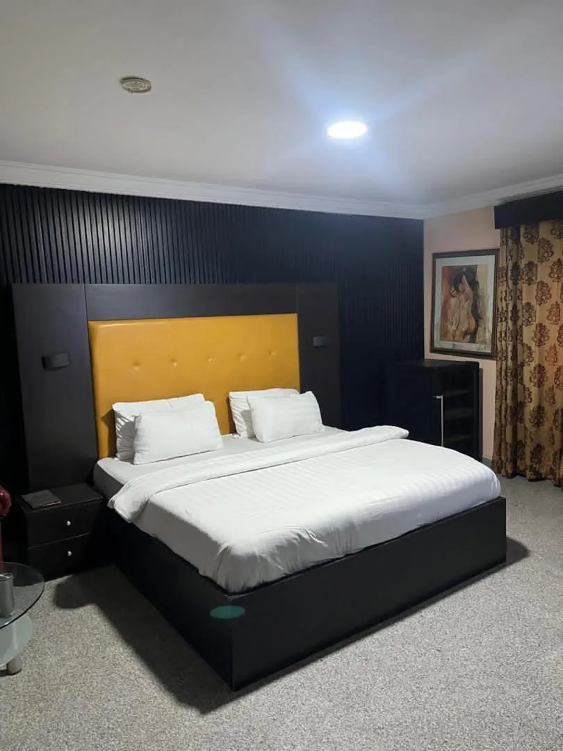 Bed in Hotel Paris Suites