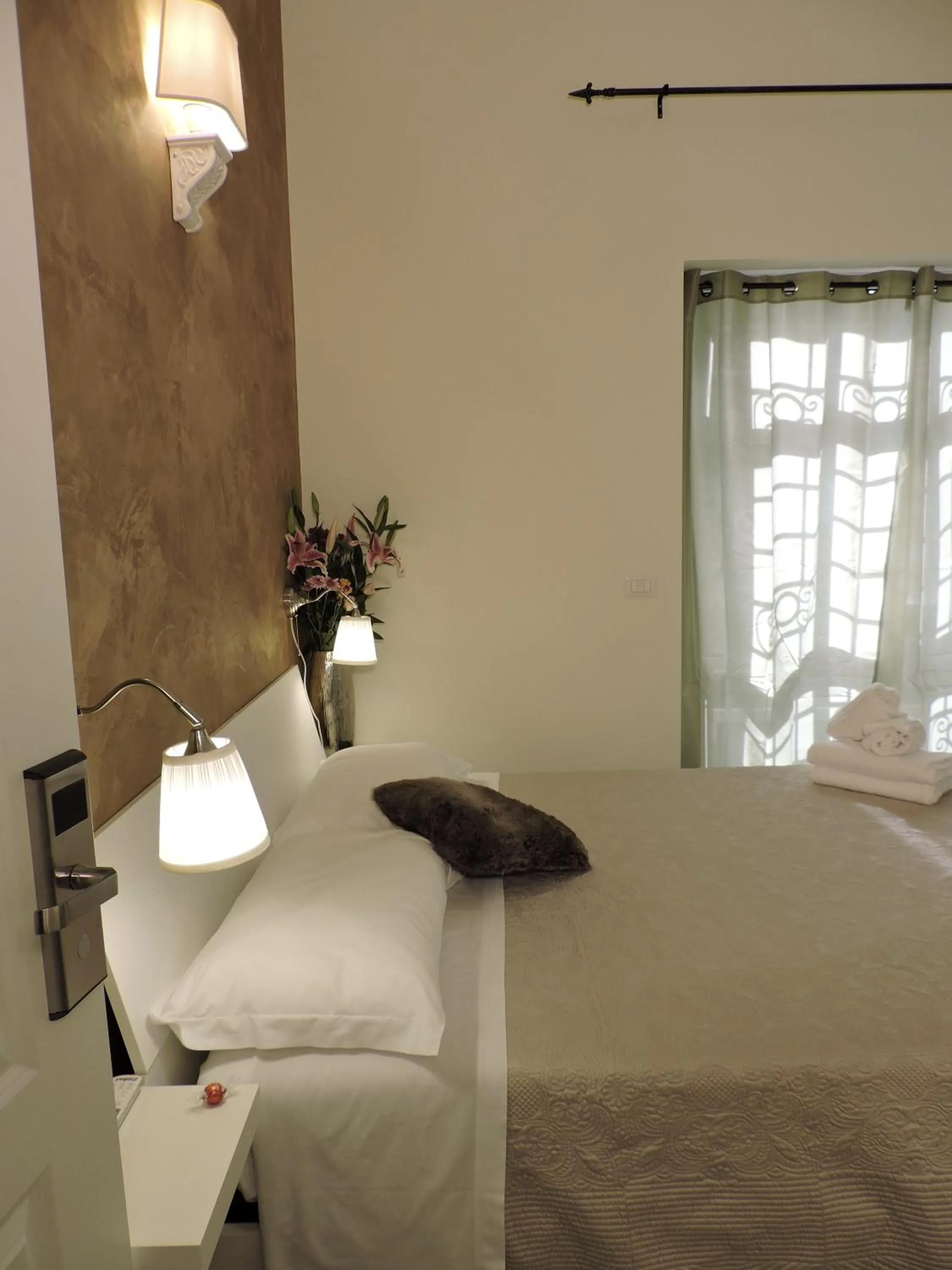 Decorative detail, Bed in Anfiteatro Suite