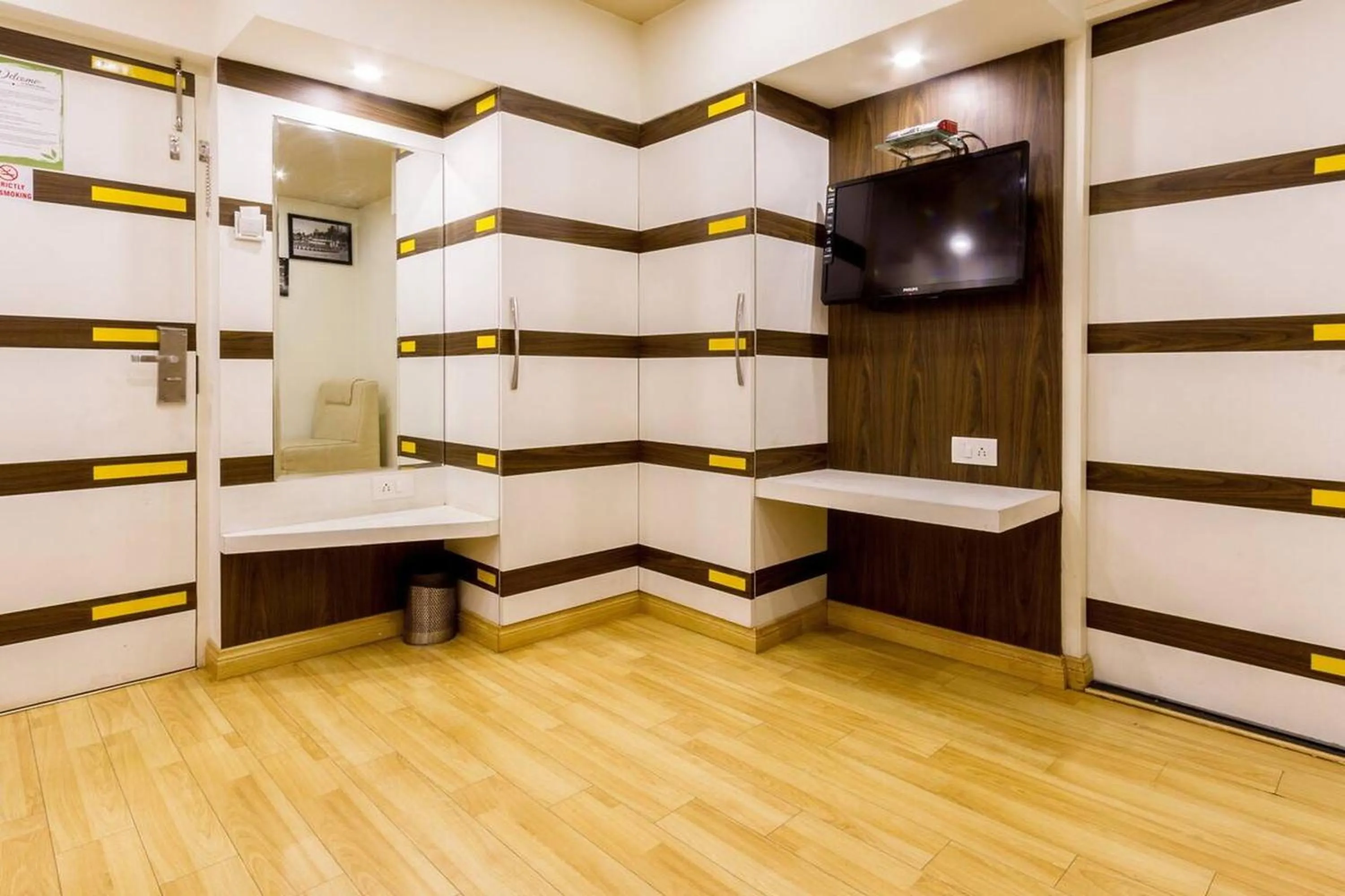 TV and multimedia in FabHotel Sholas Residency I - Nr Government Rose Garden