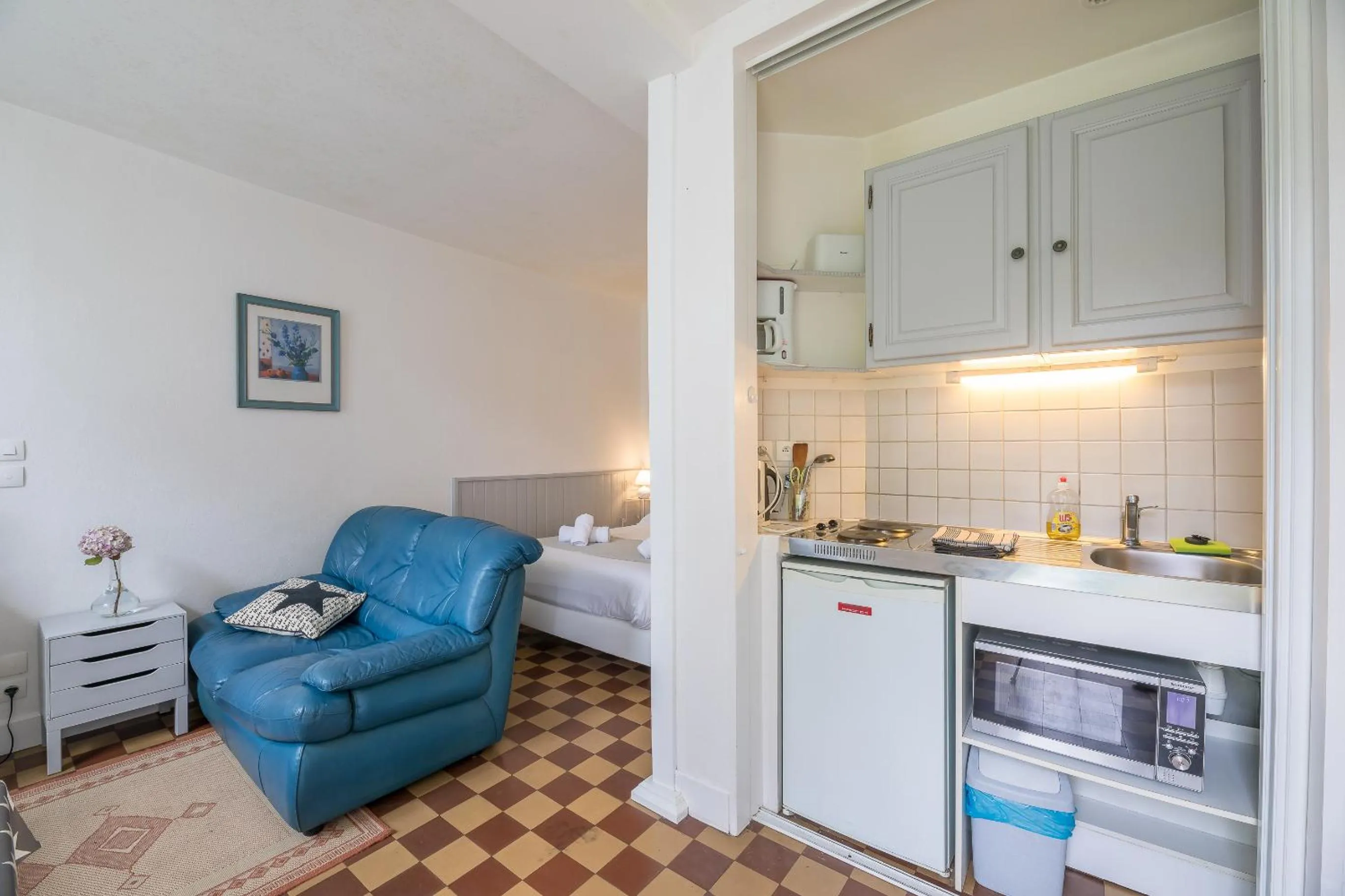 Kitchen or kitchenette in Appart'Hôtel Bellevue