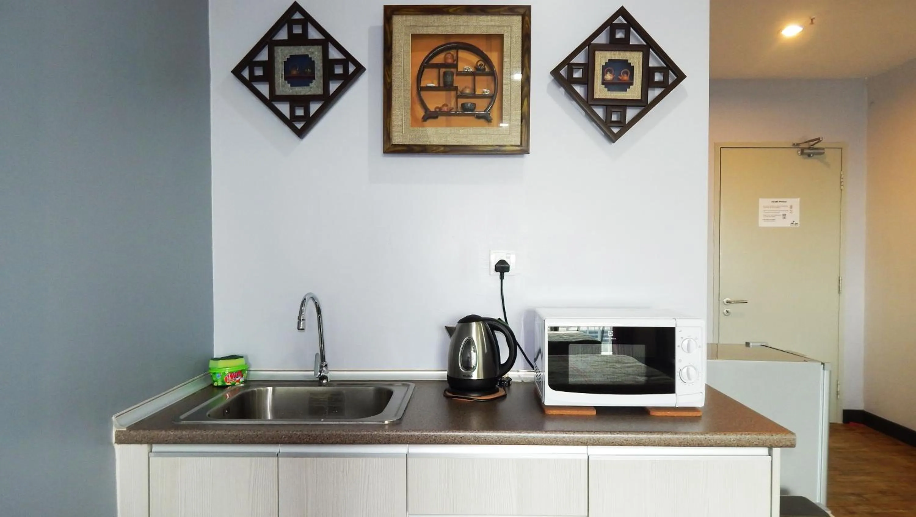 Kitchen or kitchenette in Wadi Iman Guesthouse @ i-City