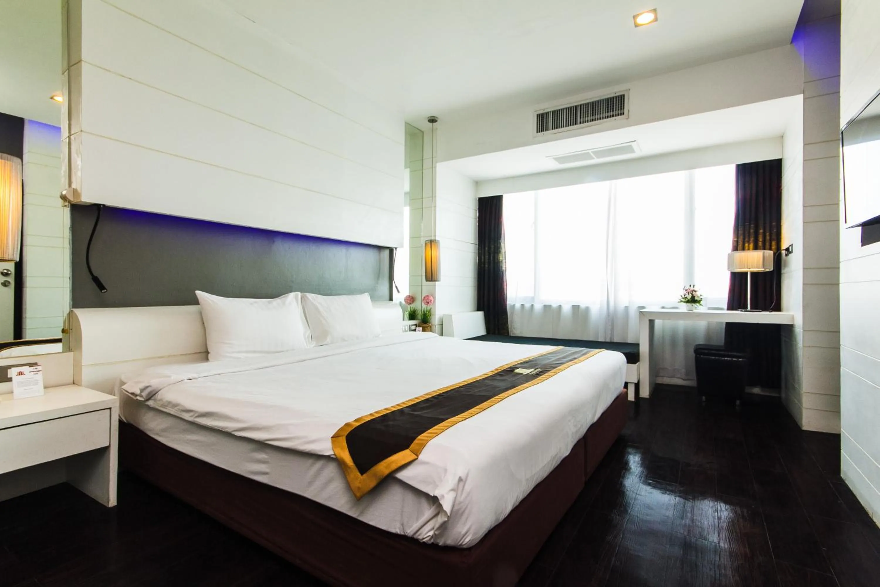 Bed in Khon Kaen Hotel