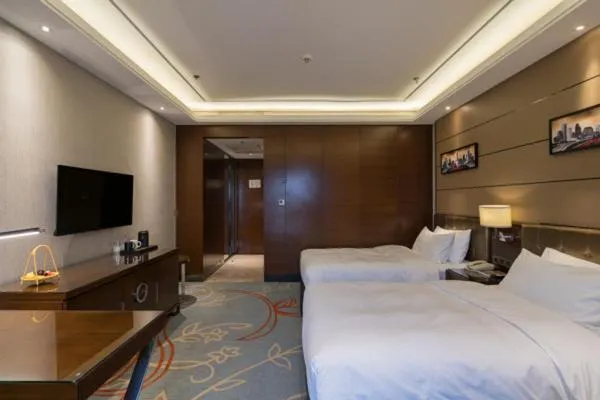Bed in Meilun Hotel, Tianjin Binhai Development Zone