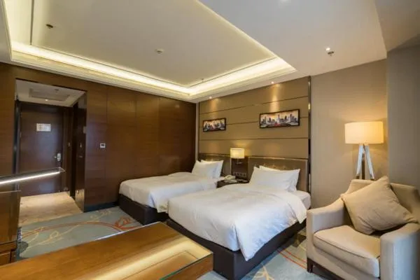 Bed in Meilun Hotel, Tianjin Binhai Development Zone