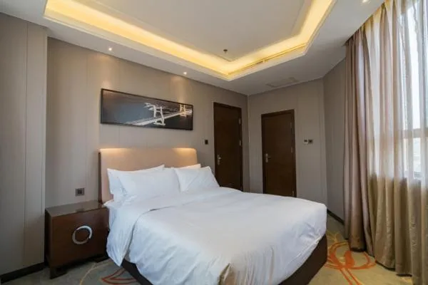 Bed in Meilun Hotel, Tianjin Binhai Development Zone