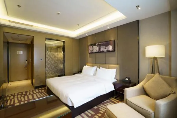 Bed in Meilun Hotel, Tianjin Binhai Development Zone