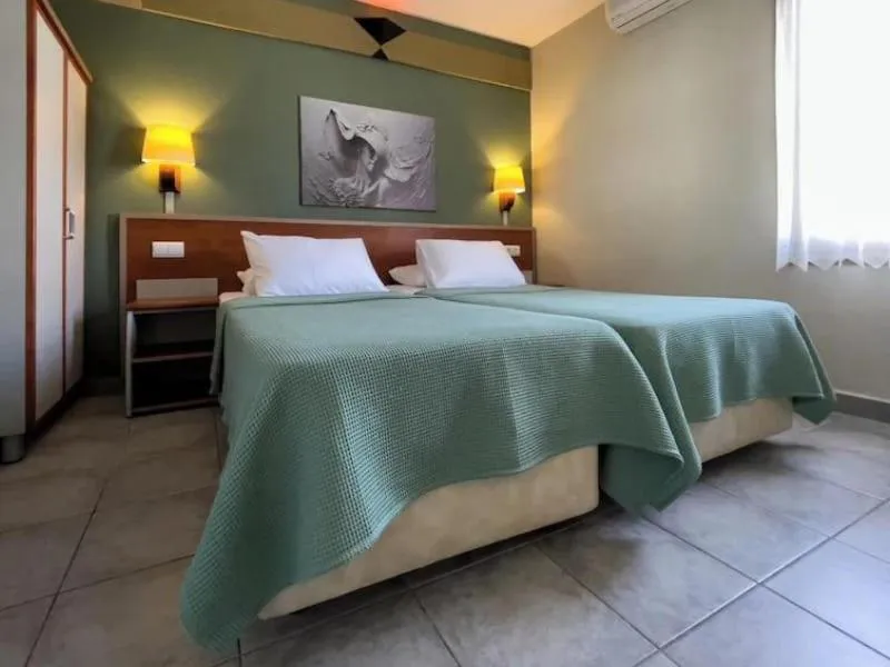 Bed in Green Mar Hotel