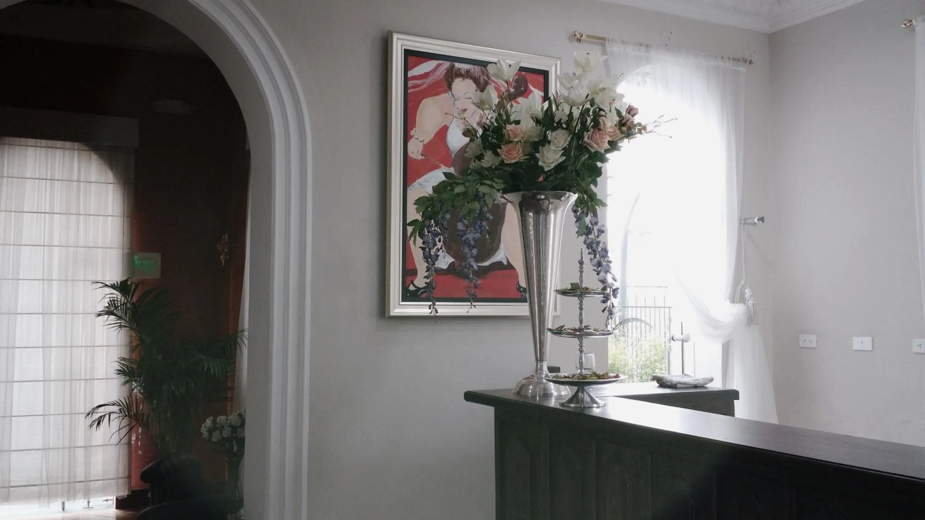 Lounge or bar in La Coupole Hotel